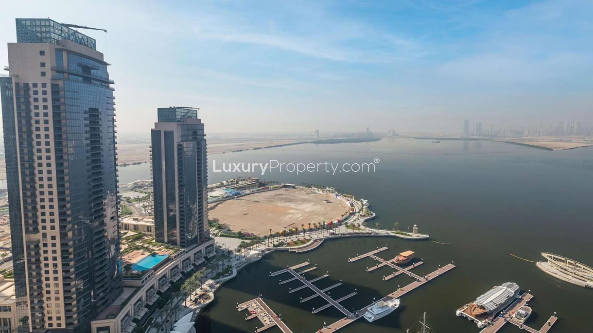 Brand-new Dubai Creekside apartment interior with panoramic skyline views and large windows