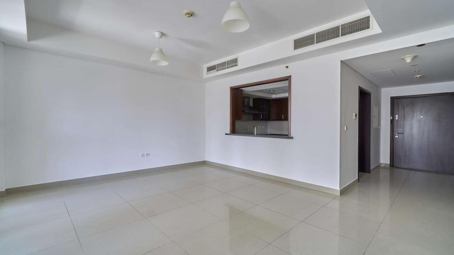 "Balcony view of Downtown Dubai from 2-bedroom apartment in 29 Burj Boulevard for rent.",Bright living area in 2-bedroom apartment, 29 Burj Boulevard, Downtown Dubai