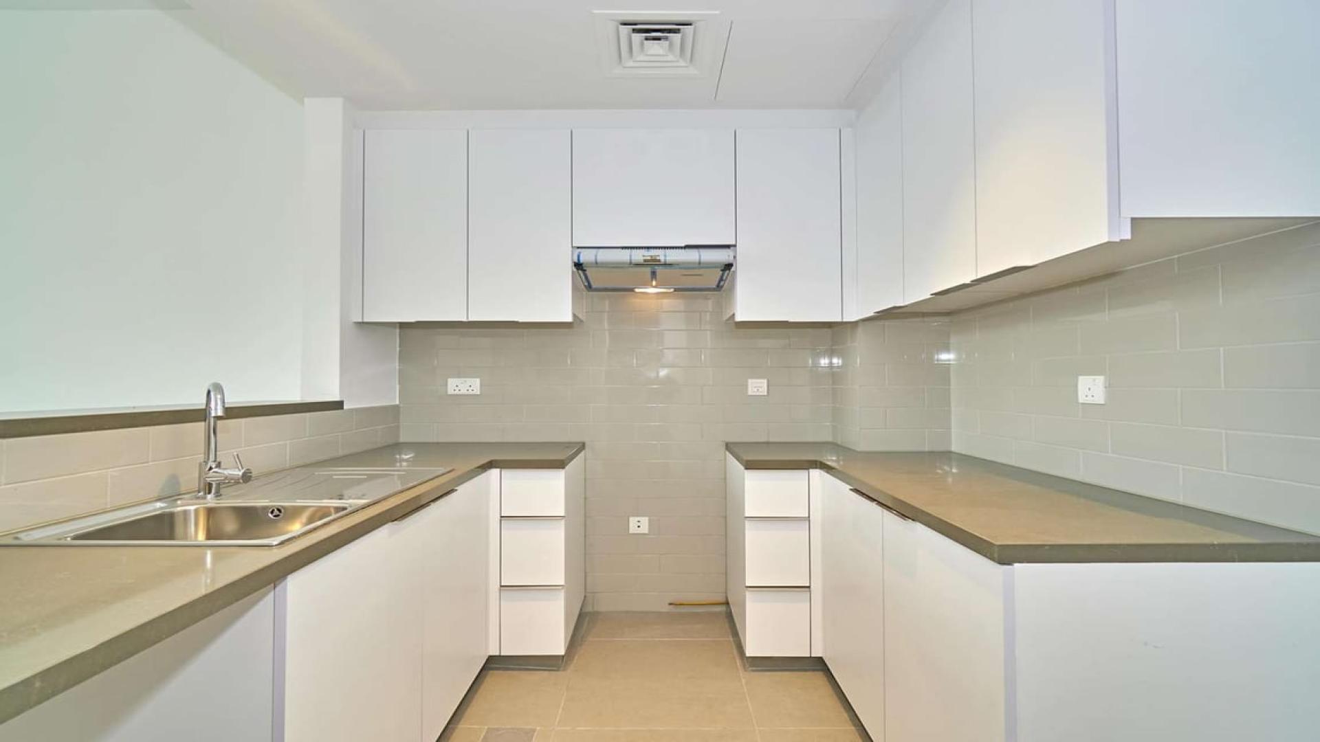 Modern kitchen in spacious 2-bedroom apartment, Mudon Views, available for rent