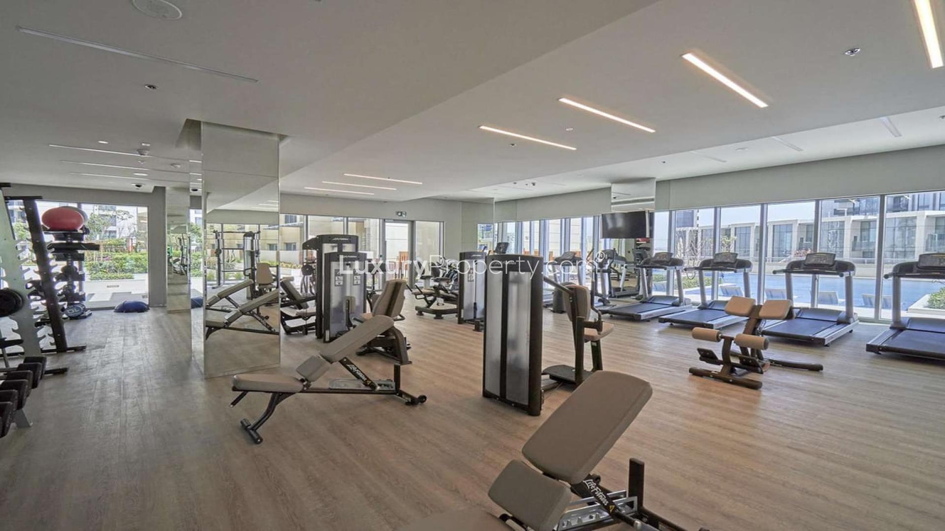 Bright, modern kitchen and living area in Dubai Creek Harbour apartment for rent