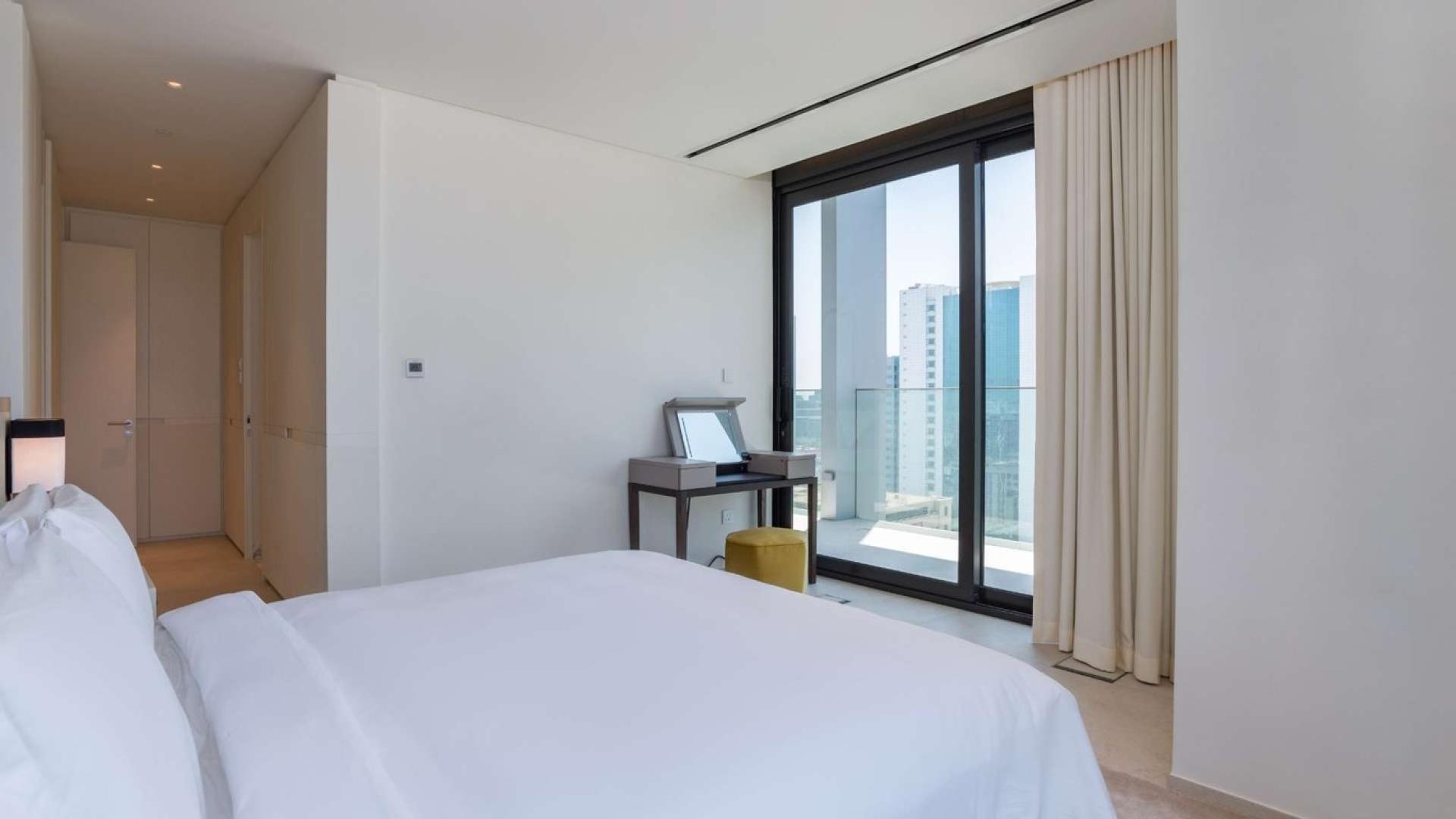 Fully furnished living and dining area in Eden House apartment, Sheikh Zayed Road