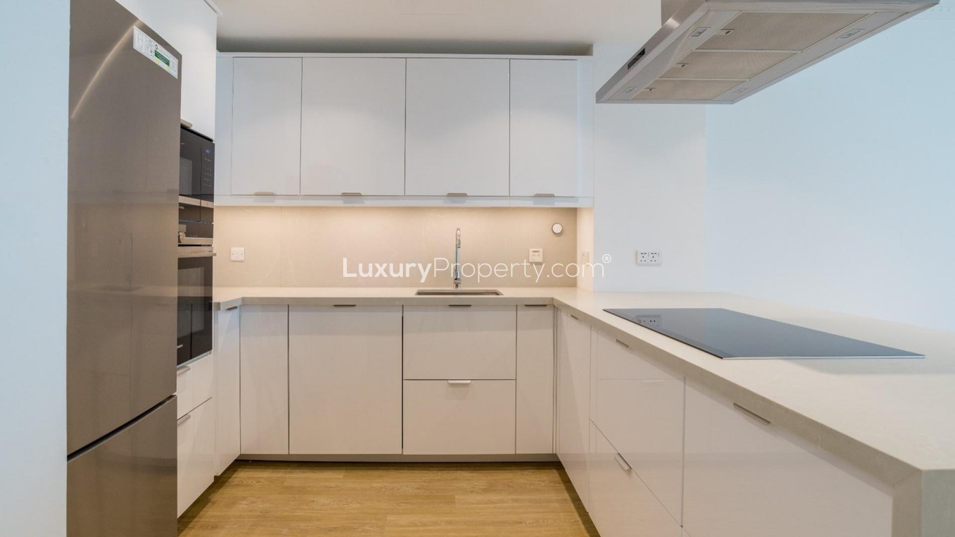 Newly renovated kitchen and living area in Al Yass Tower apartment, Dubai Marina