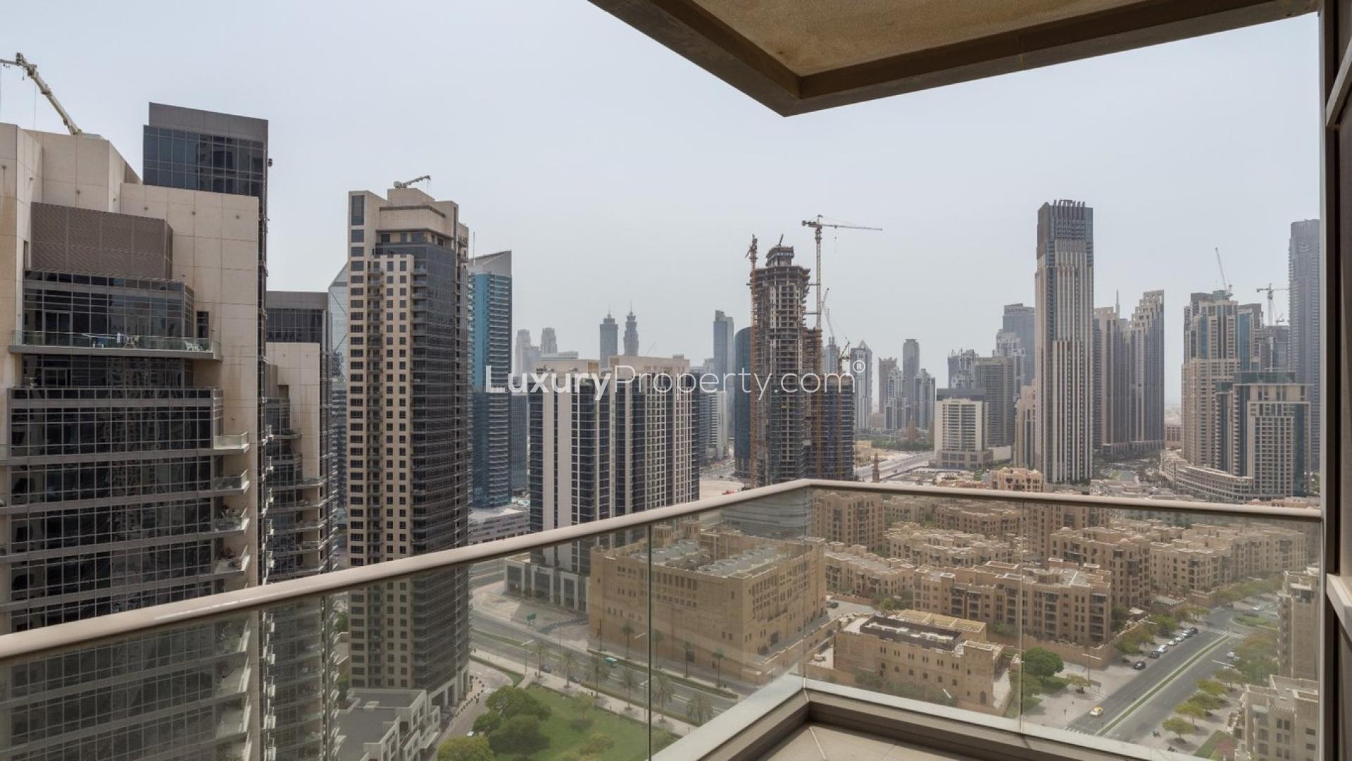 "View from 2-bedroom apartment in South Ridge, Downtown Dubai, featuring iconic skyline.",View from 2-bedroom apartment balcony in South Ridge, Downtown Dubai, showcasing city skyline