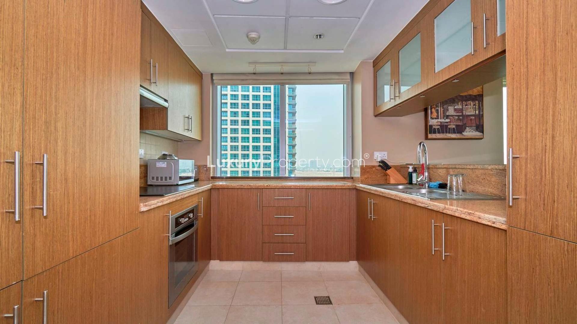 Modern living room in two-bedroom apartment, The Fairways West Tower, The Views community