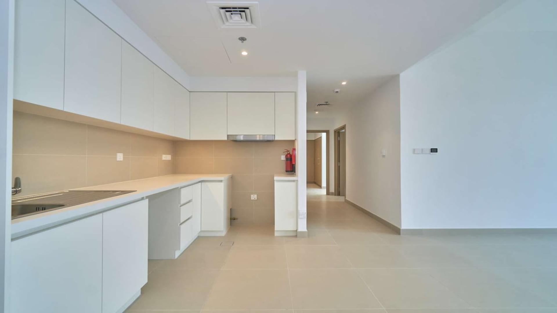 Balcony view from apartment in Creek Horizon, Dubai Creek Harbour, overlooking cityscape and waterfront