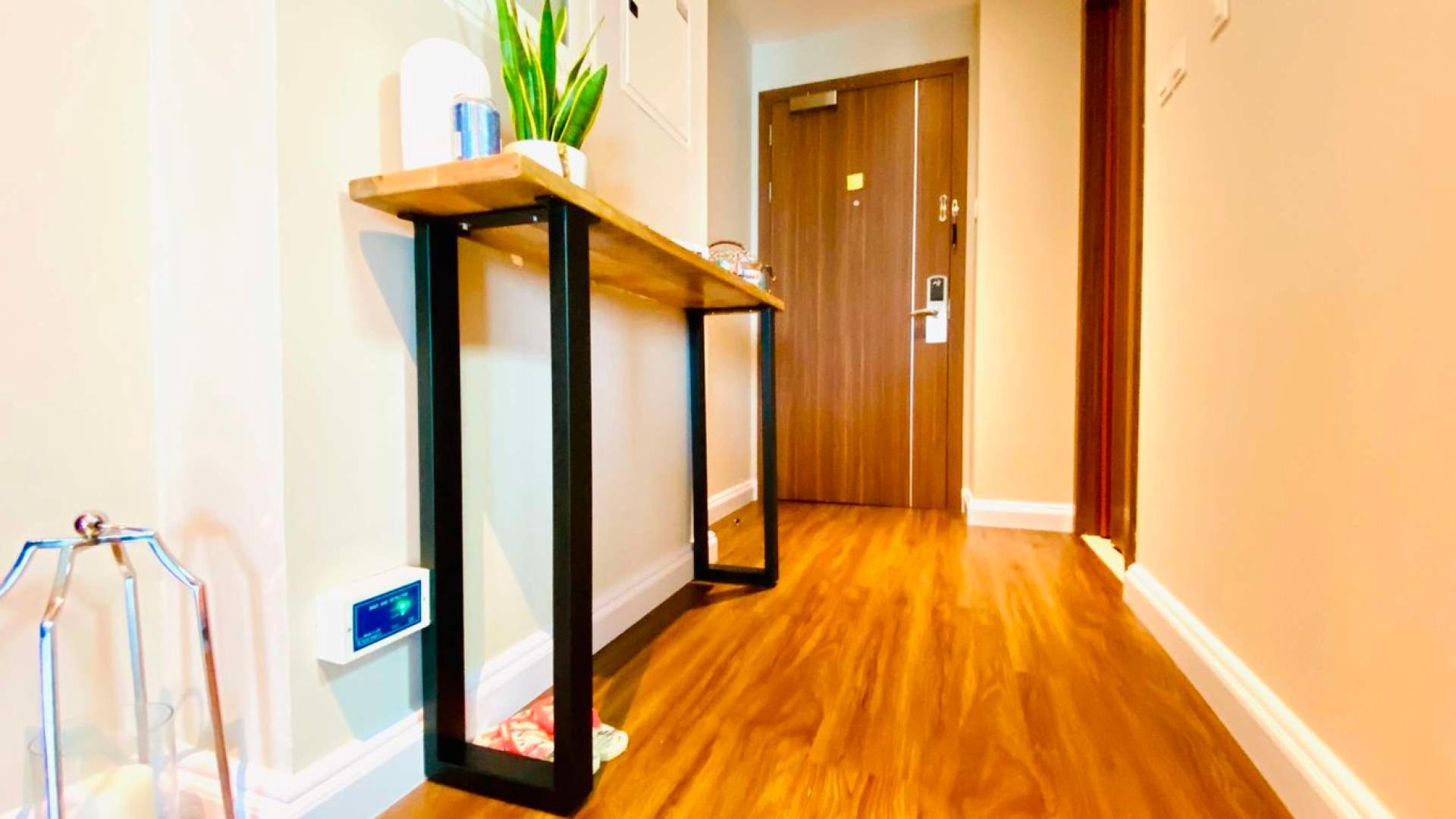 Entryway of upgraded 2-bedroom apartment in The Imperial Residences, JVT for rent