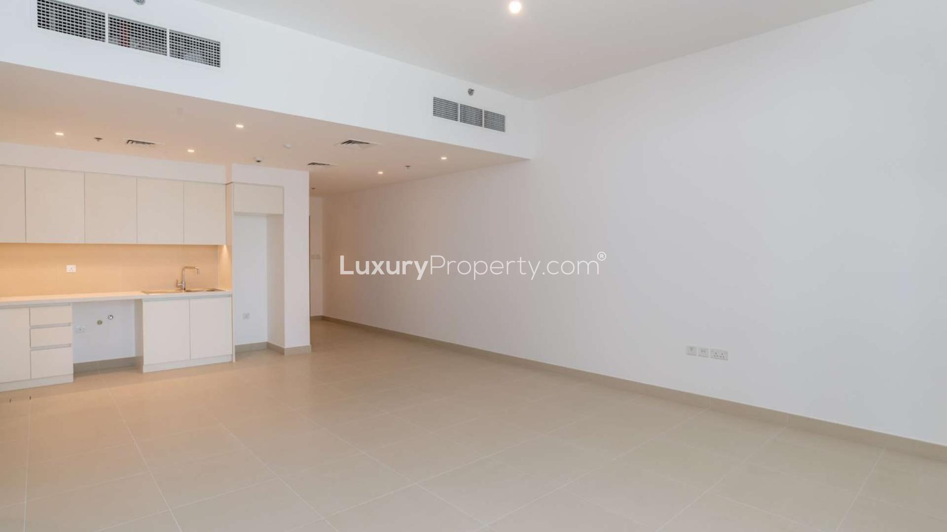 Bright living area with balcony in 2-bedroom apartment, Creek Horizon, Dubai Creek Harbour