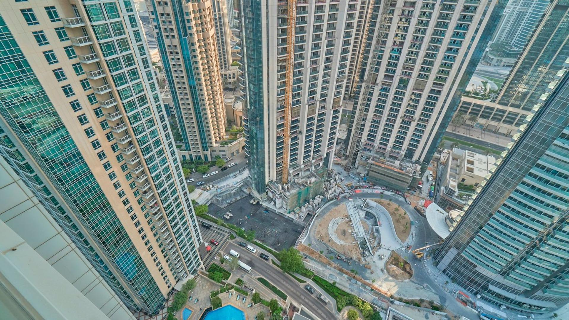 Furnished living room in 2-bedroom apartment, The Residences, Downtown Dubai, with modern decor