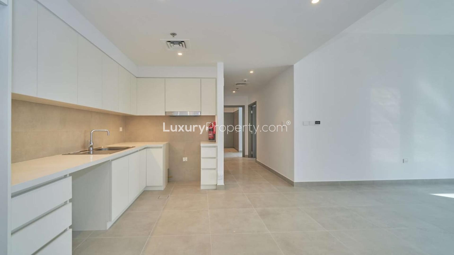 Bright living room in 2-bedroom apartment, Creek Horizon, Dubai Creek Harbour, floor-to-ceiling windows