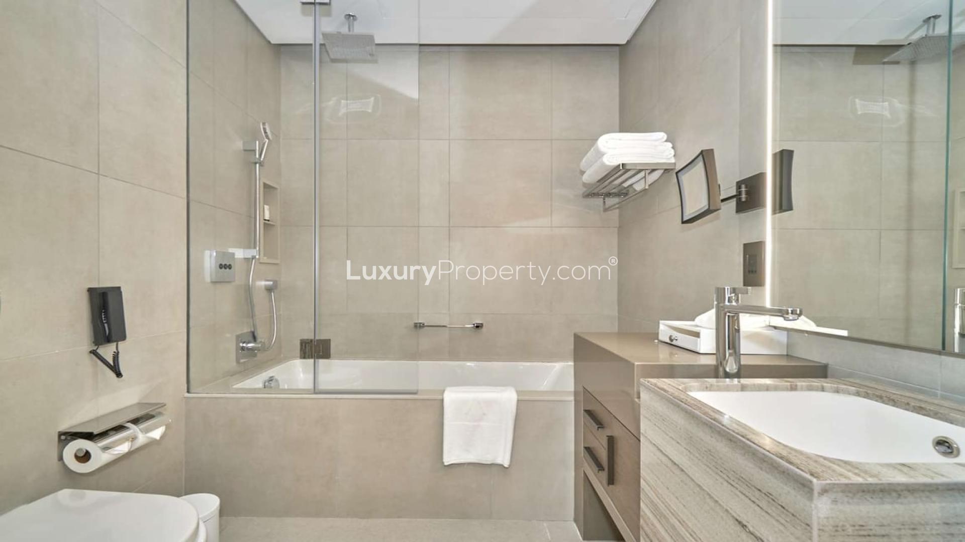 Modern living room and kitchen in 2-bedroom serviced apartment, Address JBR, sea views