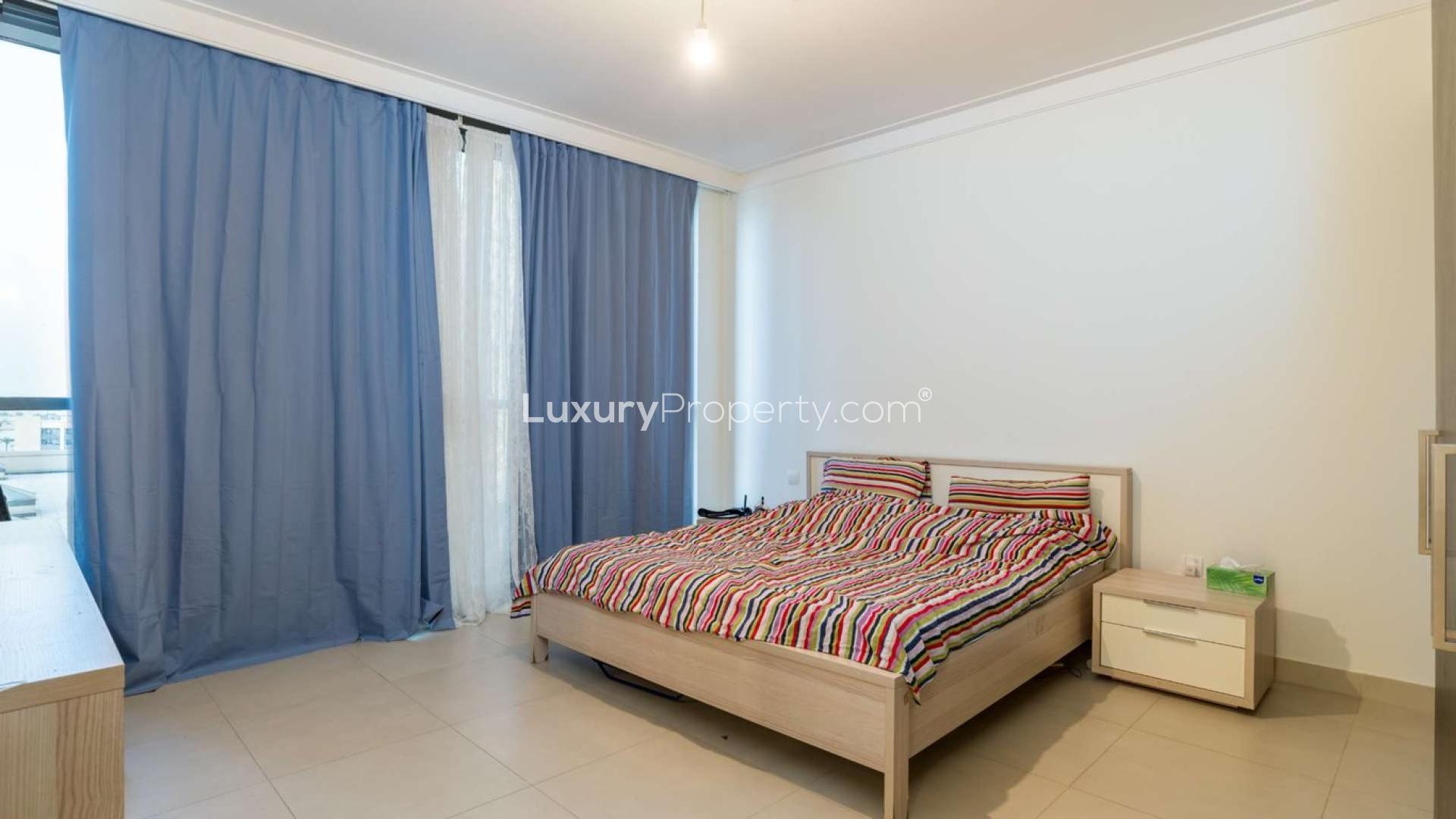 Living room in spacious 2-bedroom apartment, Dubai Creek Residences North Tower, modern furnishings