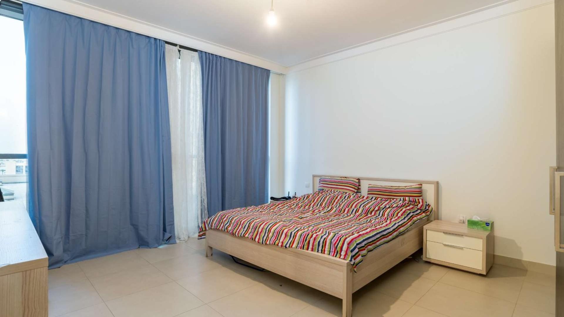 Living room in spacious 2-bedroom apartment, Dubai Creek Residences North Tower, modern furnishings