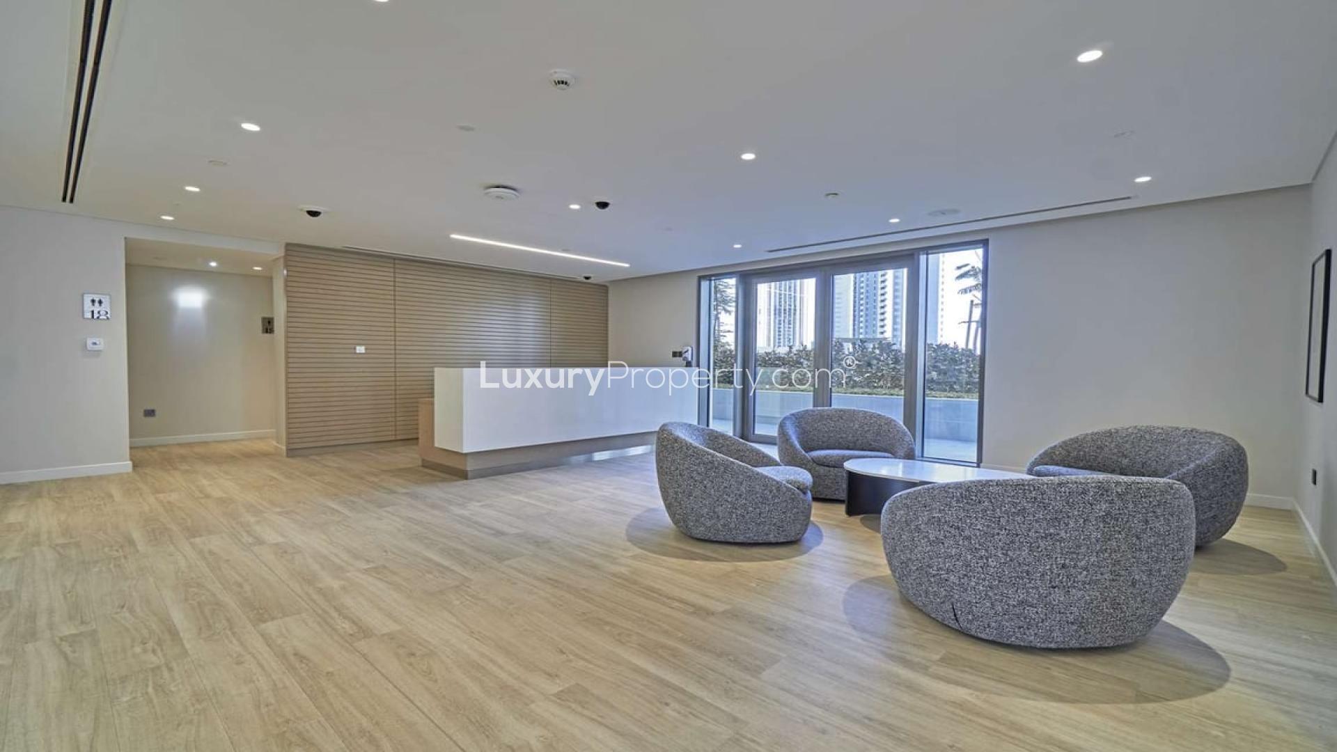 Modern lounge area in Creekside 18 apartment, Dubai Creek Harbour, featuring stylish seating