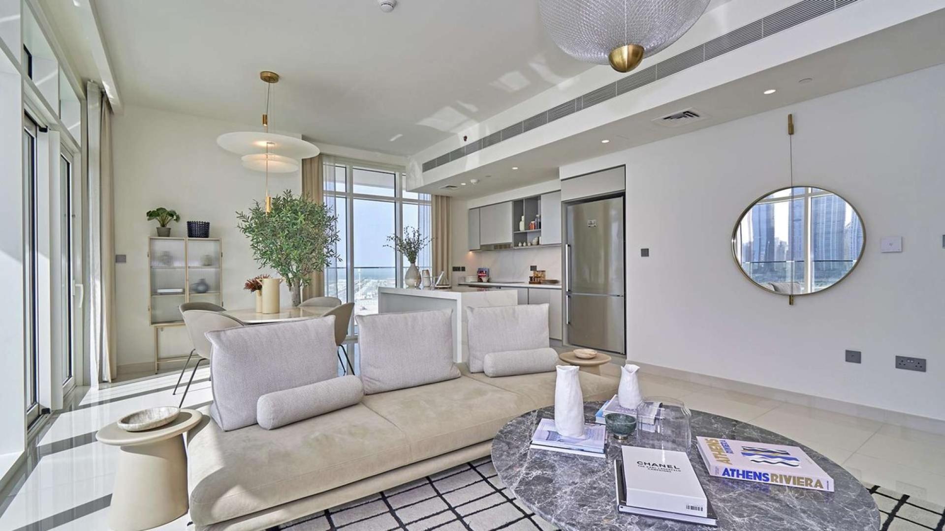 Modern living room in Sunrise Bay, Emaar Beachfront apartment, Dubai Harbour. Bright and spacious