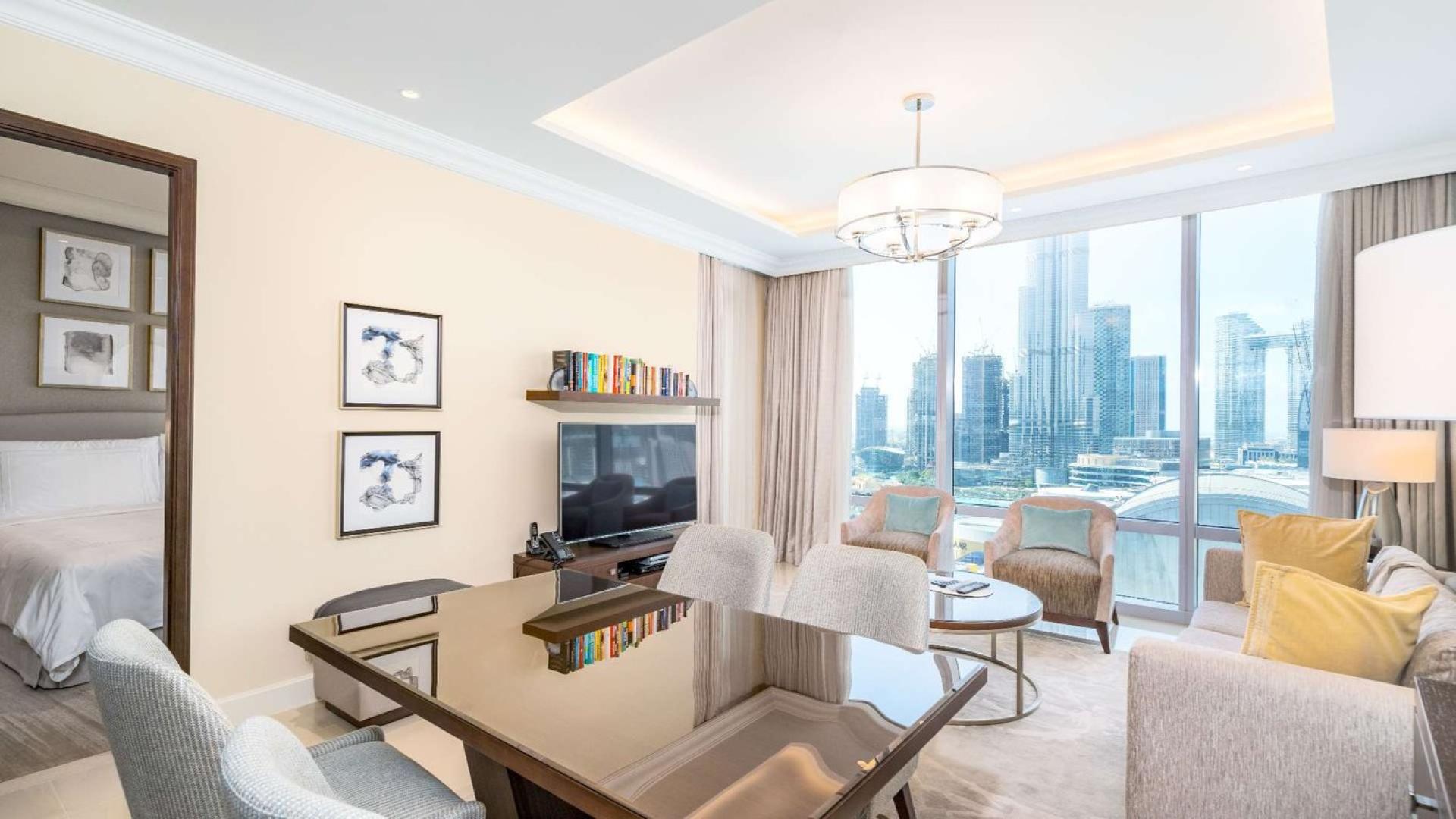 Fully furnished living room with city view in Downtown Dubai apartment for rent
