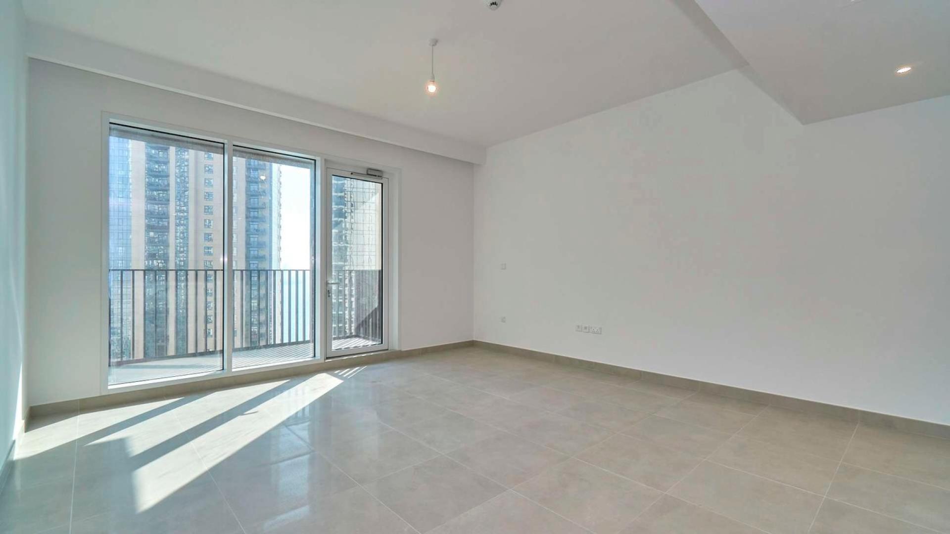 High-floor 2-bedroom apartment interior with modern kitchen in Creek Horizon, Dubai Creek Harbour