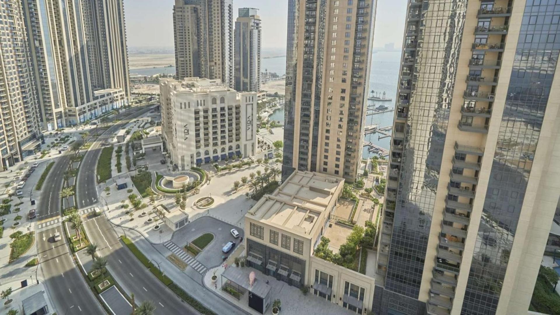 High-floor 2-bedroom apartment interior, Creek Horizon, Dubai Creek Harbour, spacious open-plan layout