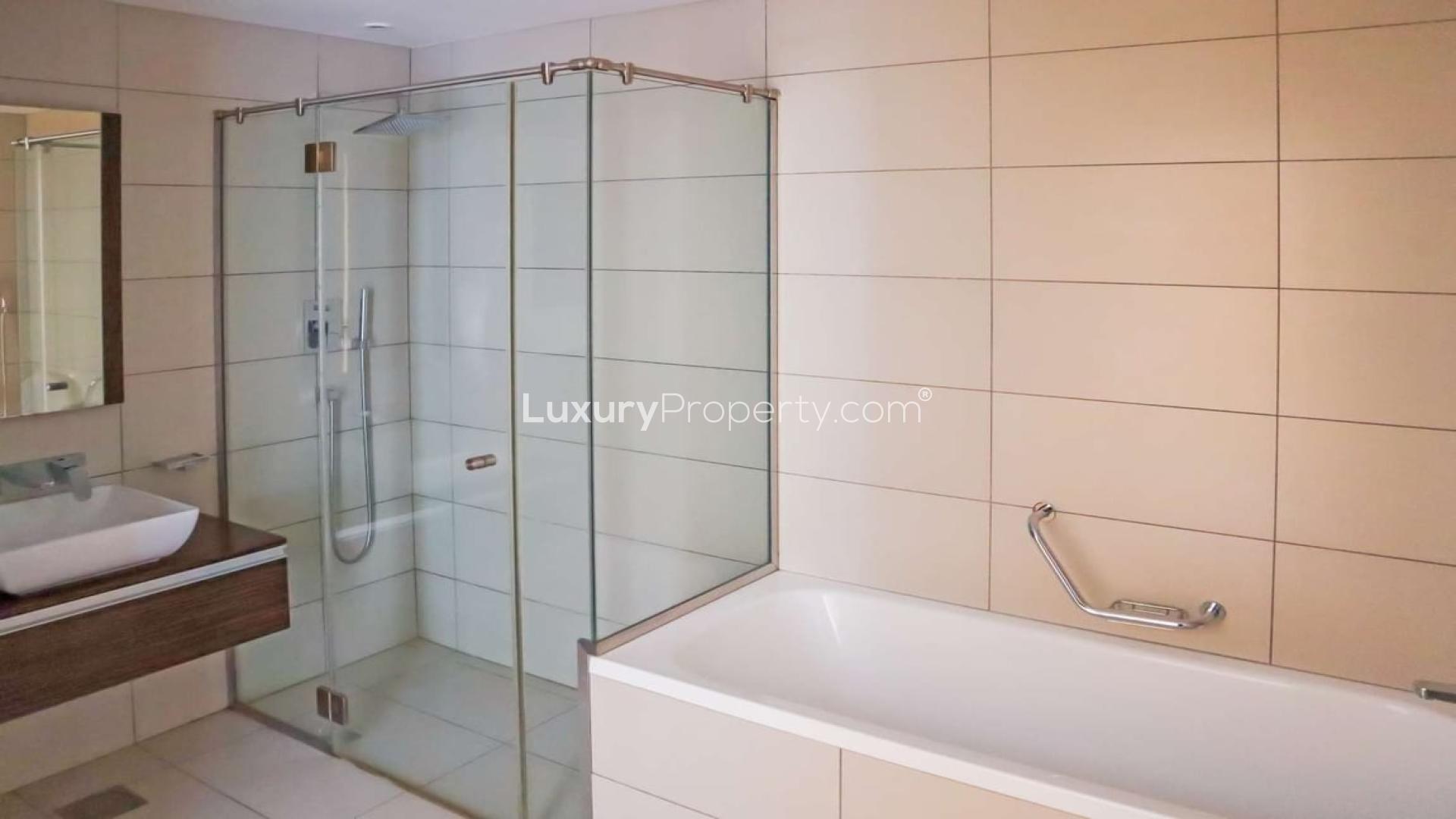 Open plan kitchen and living area in Ariyana Tower apartment, Dubai Marina for rent