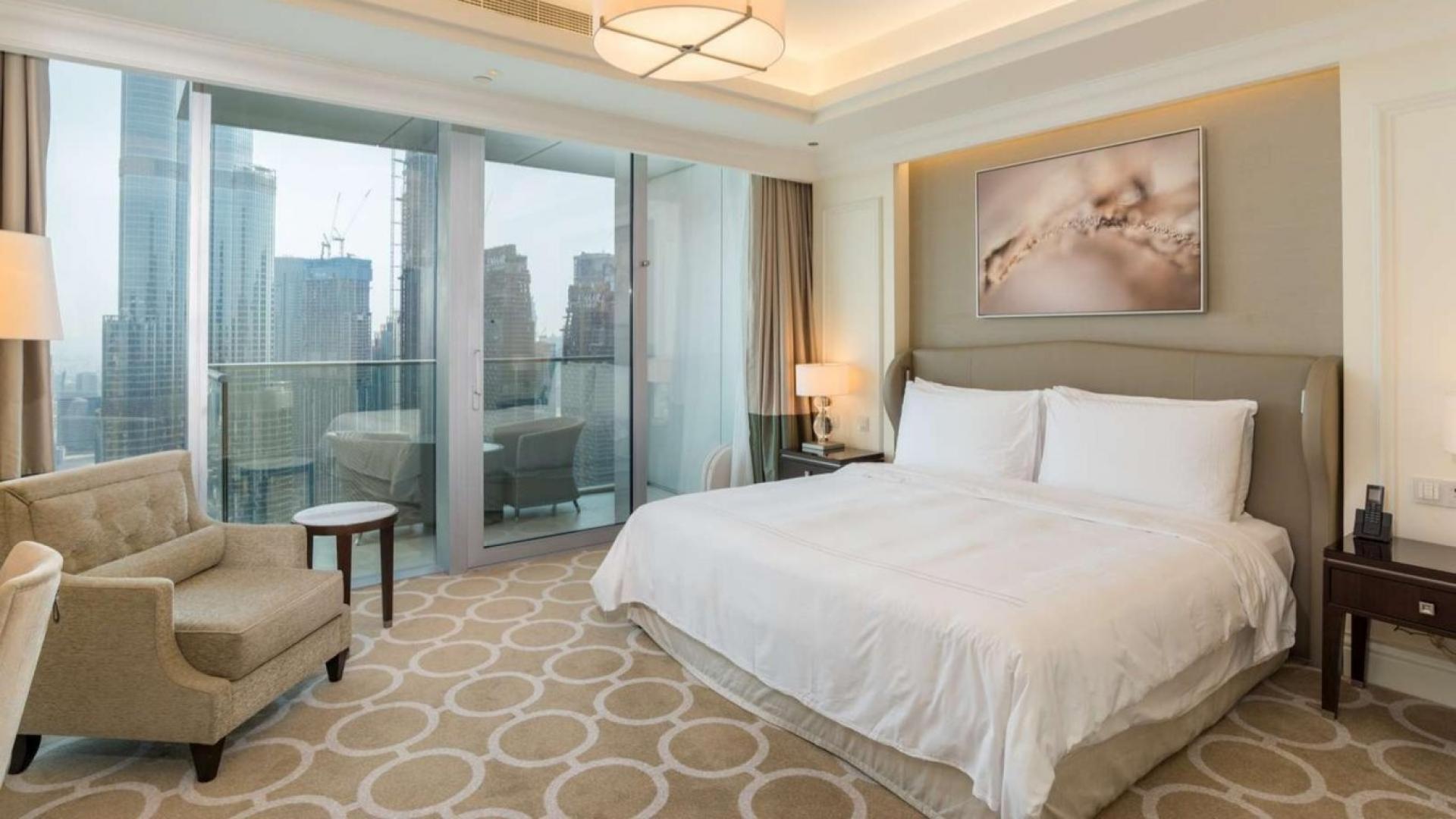 Luxurious living room in The Address The BLVD apartment, Downtown Dubai, with Burj Khalifa view