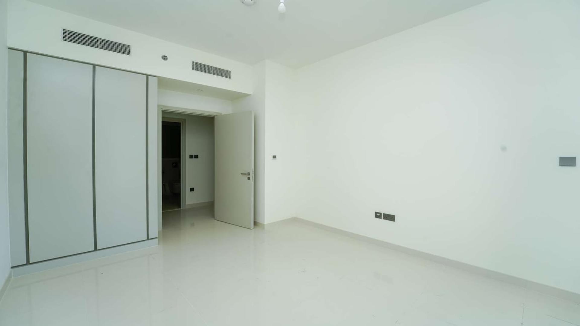 Empty luxury apartment room with sea view at Emaar Beachfront, Dubai Harbour