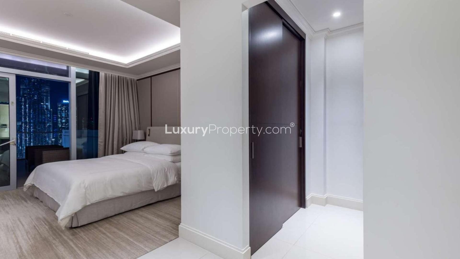 Night view of Downtown Dubai skyline with Burj Khalifa from The Address Residence Fountain Views