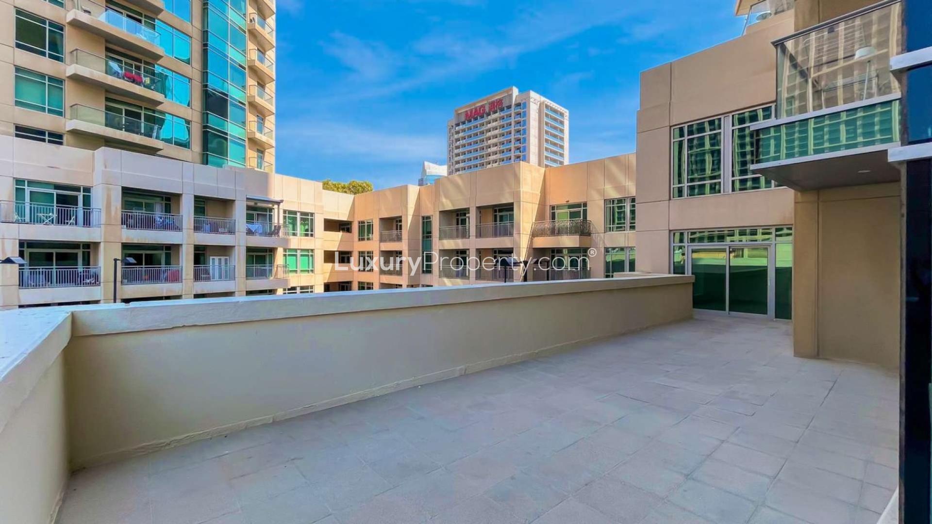 Burj Views apartment complex with pool in Downtown Dubai, available for rent