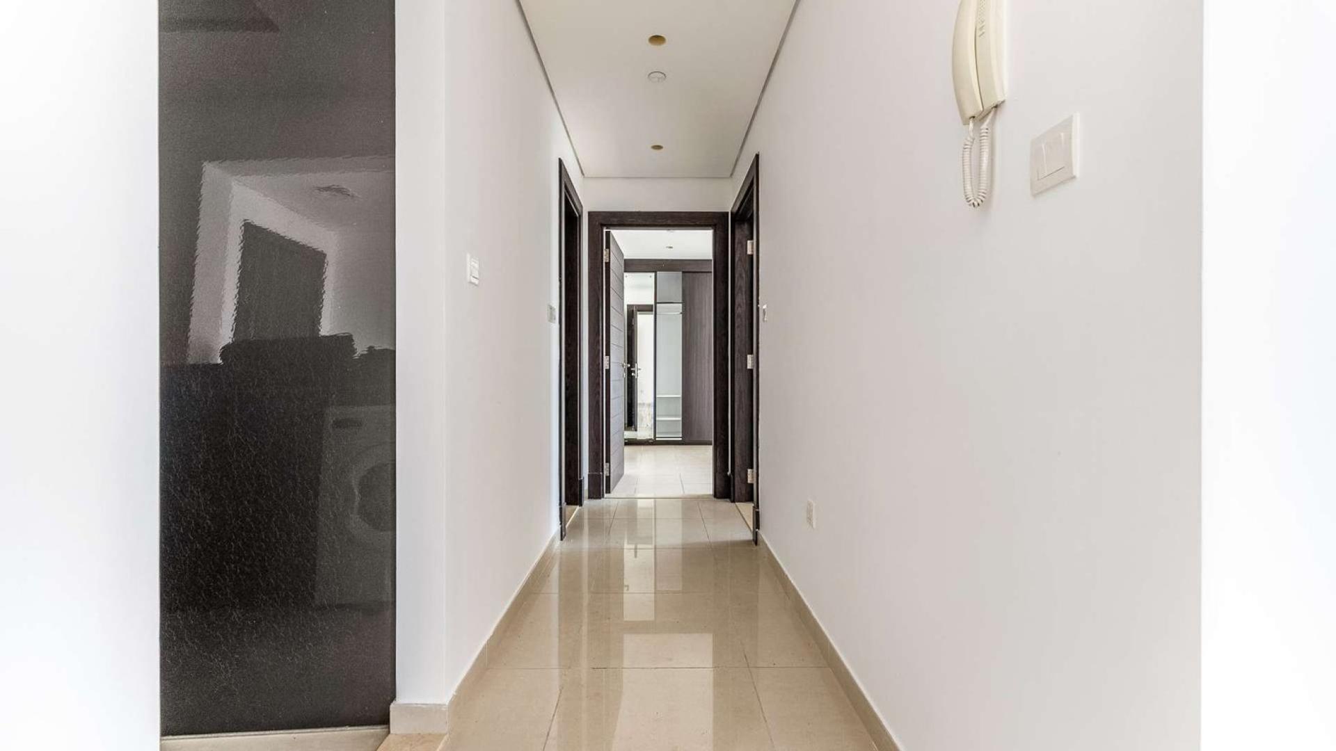 Dubai Marina view from Silverene apartment, showcasing waterfront and skyscrapers, available for rent