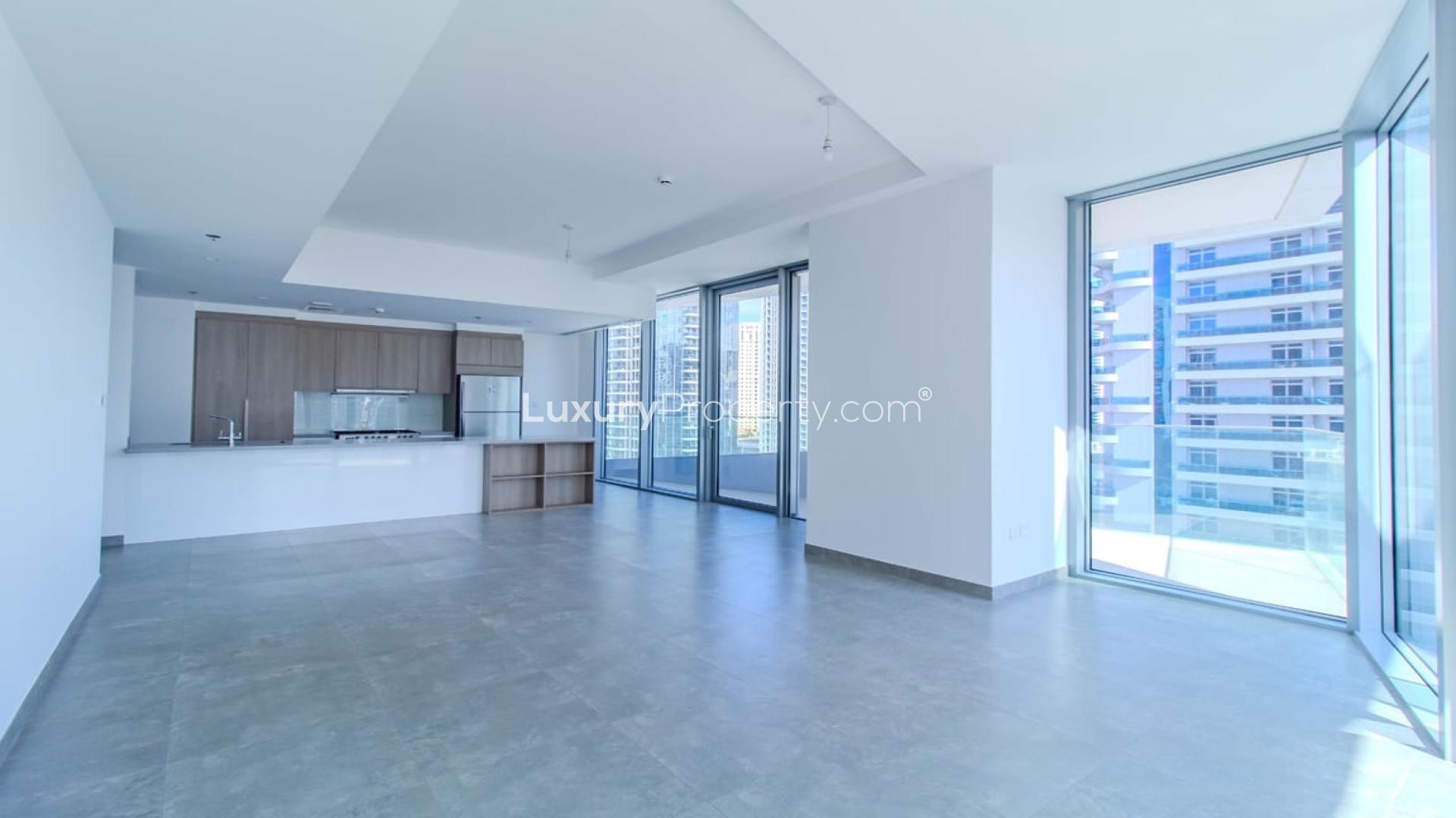 Luxury open-plan kitchen in 2-bedroom Dubai Marina apartment with marina view