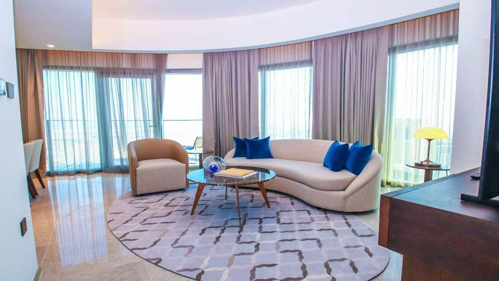 Balcony view of Dubai Creek Harbour skyline and sea at Address Harbour Point apartment