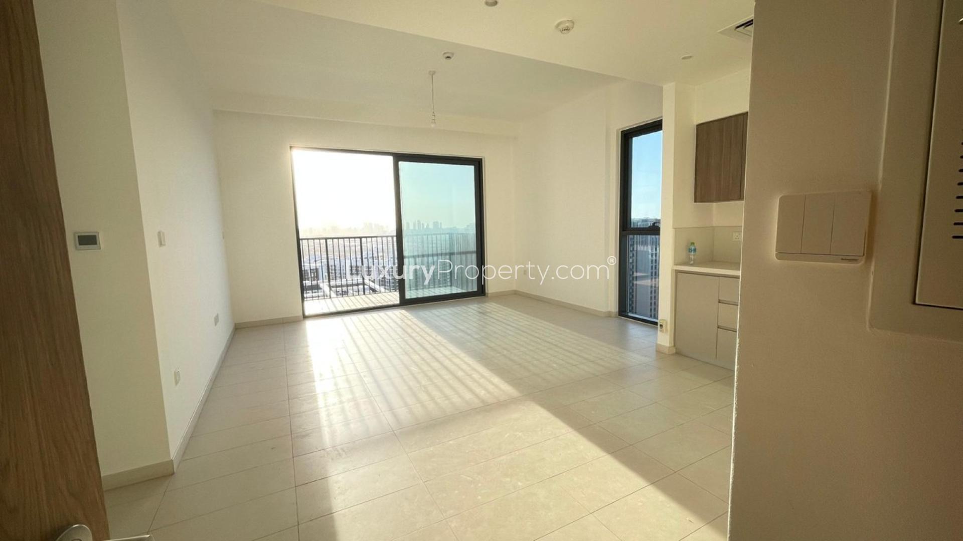 High-floor apartment view of Dubai Hills Estate skyline, Park Ridge community, sunny day