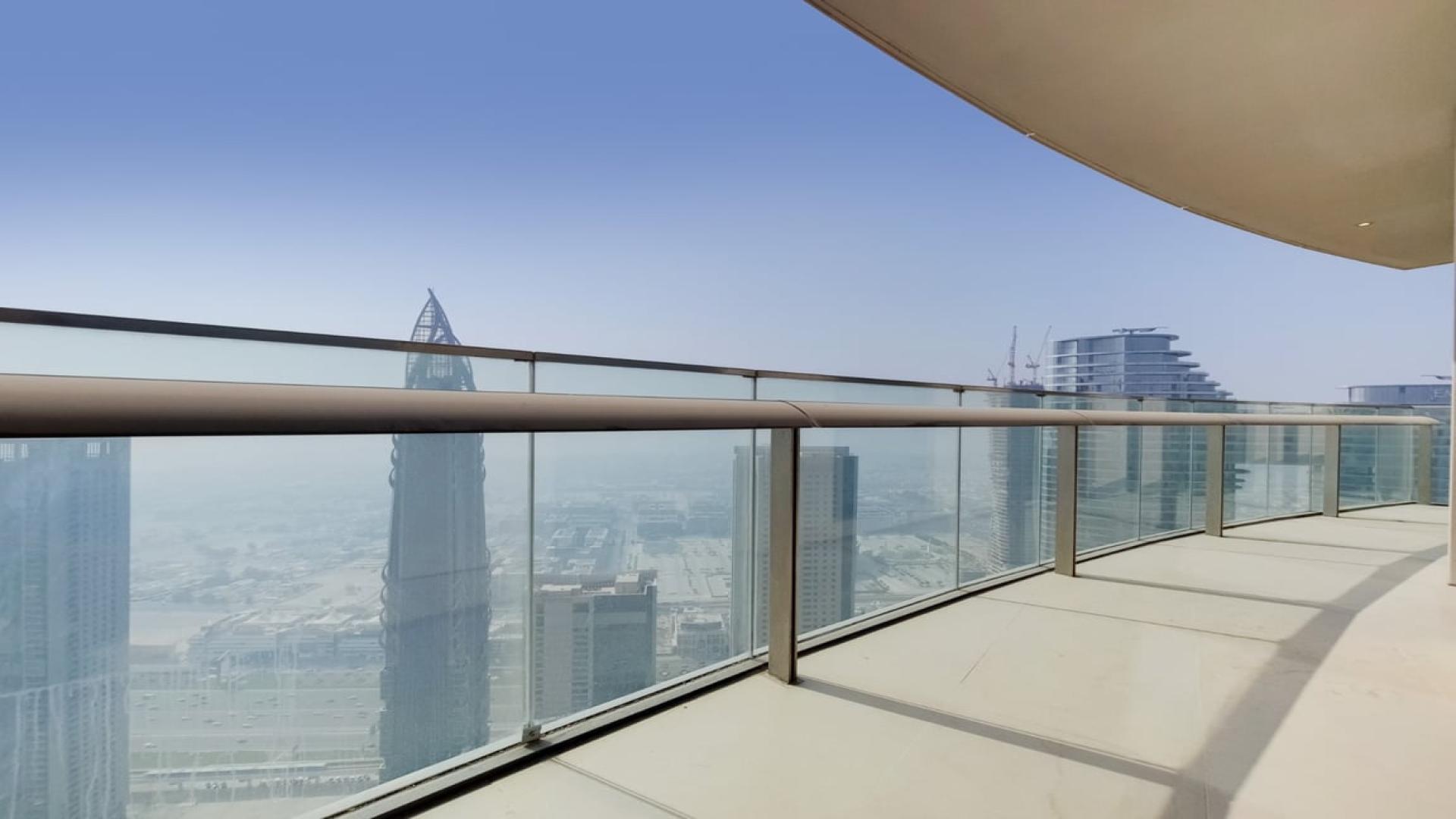 Vacant living room in Burj Vista apartment with Dubai skyline views, Downtown Dubai