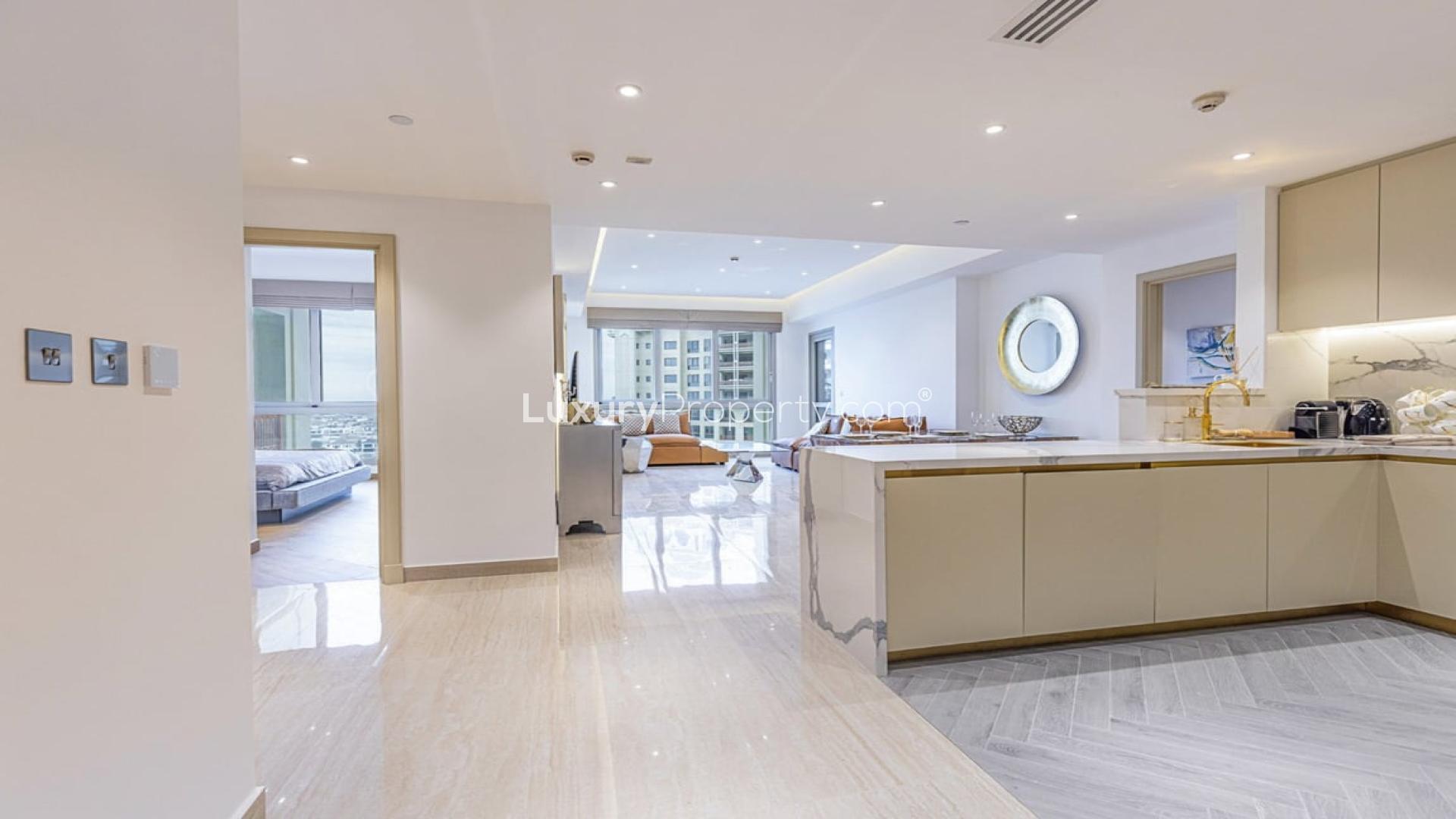 Furnished living room in Marina Residences apartment, featuring modern decor and custom upgrades