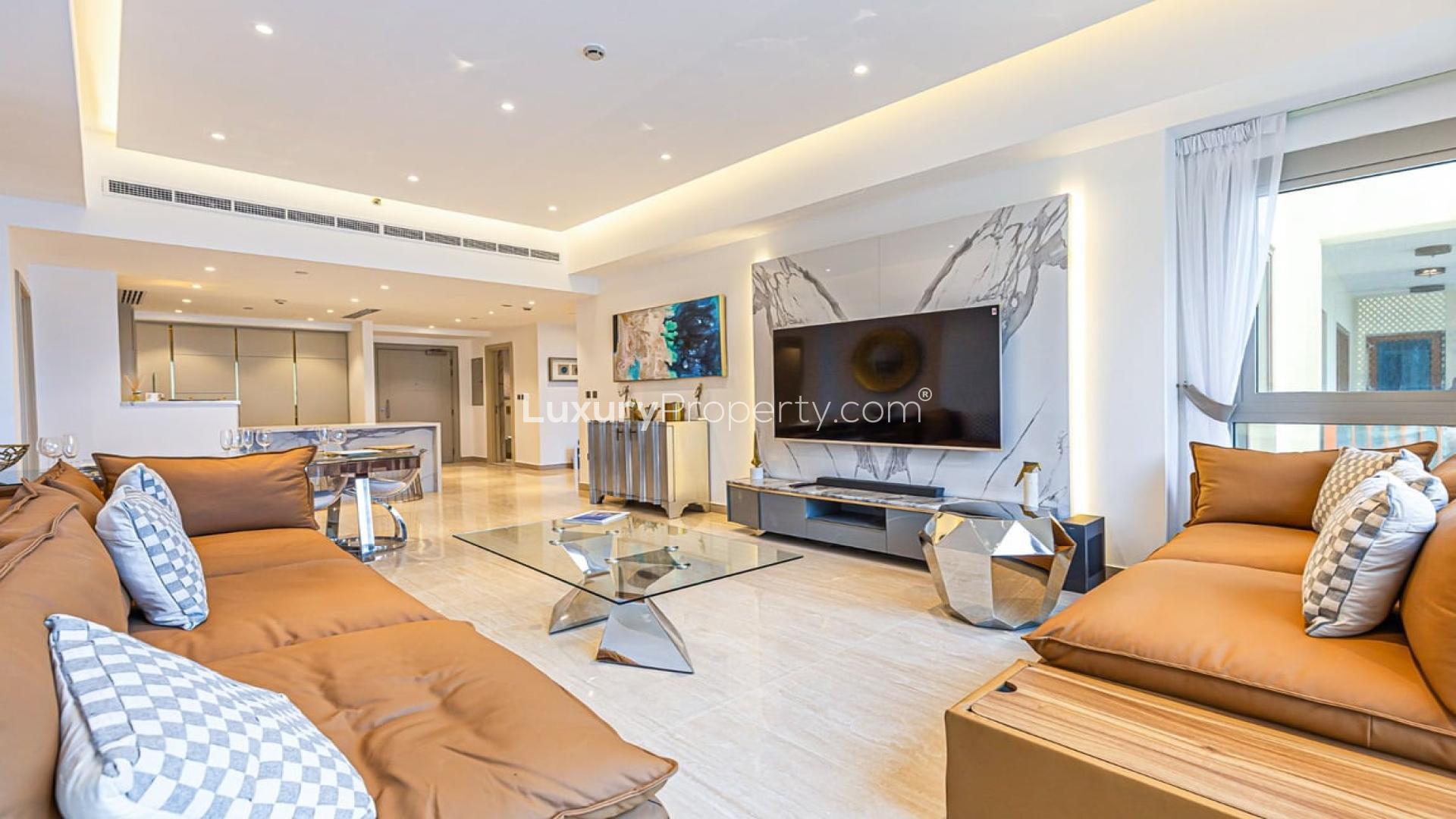 Furnished living room in Marina Residences apartment, Palm Jumeirah, with modern decor and city view