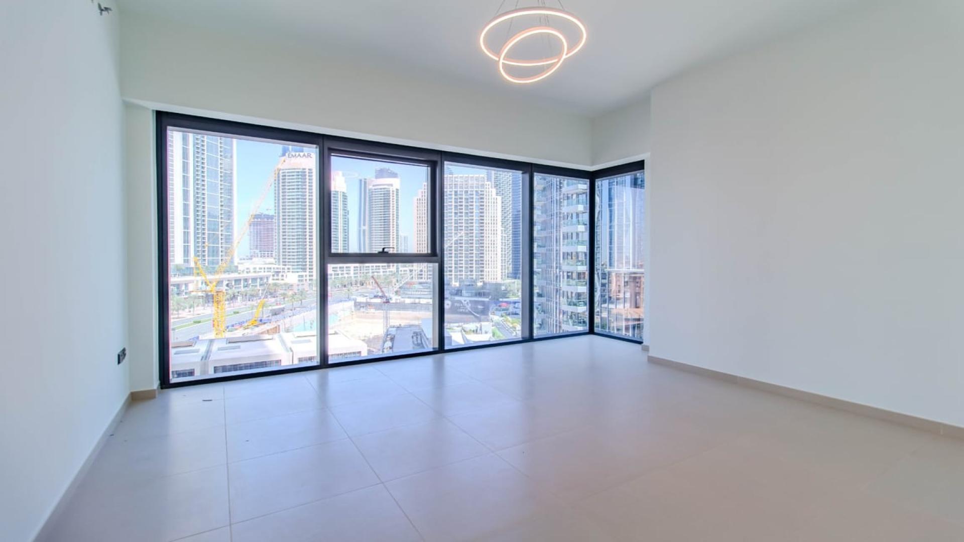 View of Downtown Dubai skyline from apartment in Opera District, Dubai Fountain visible