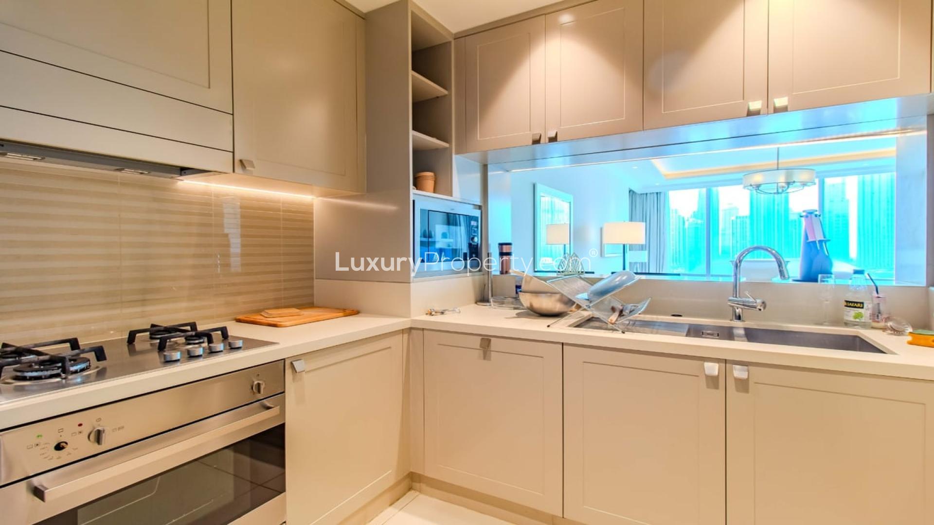 Modern kitchen in Downtown Dubai apartment, The Address Residence Fountain Views, for rent