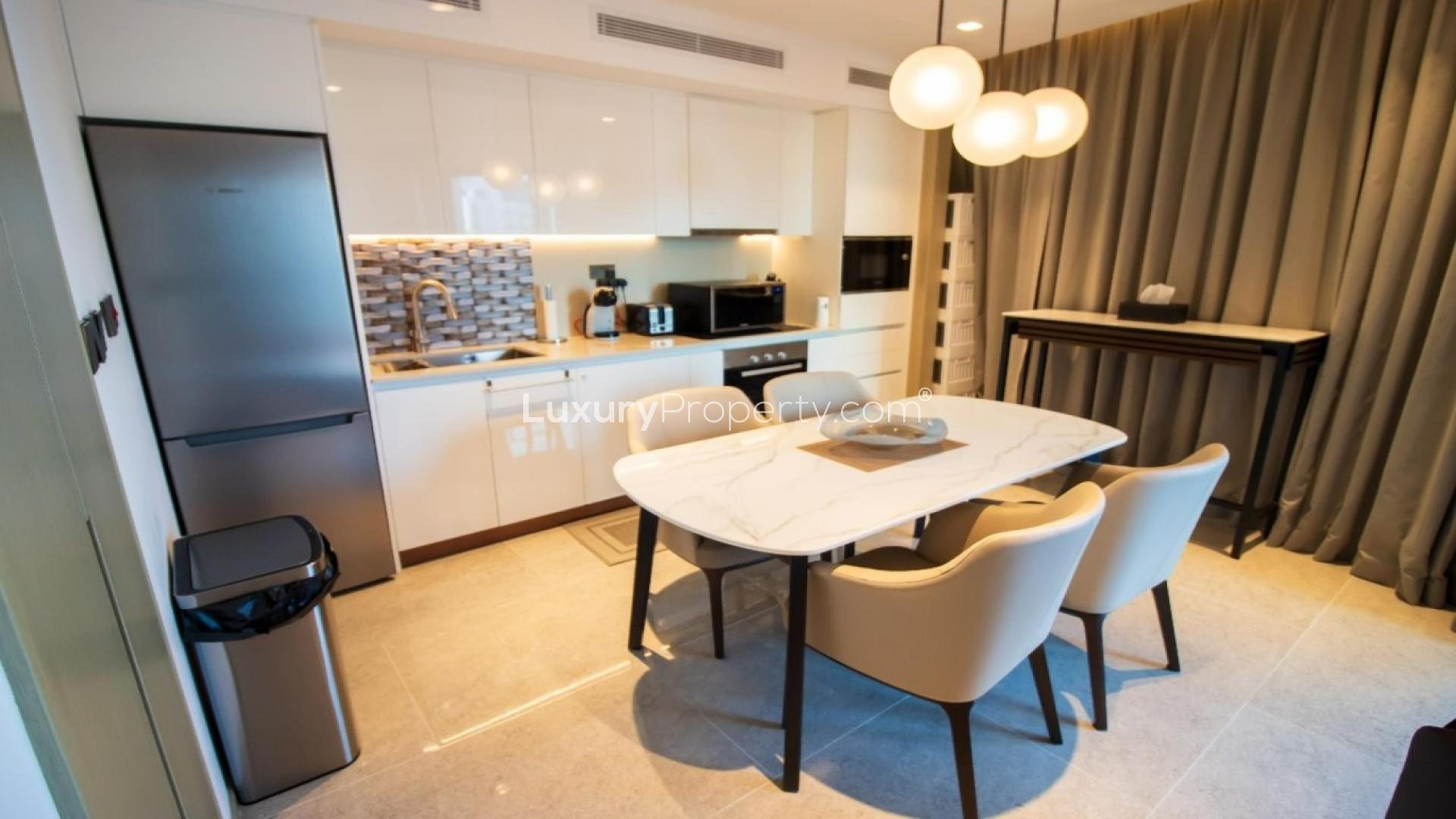 Modern kitchen and dining area in 2-bedroom apartment, Address Harbour Point, Dubai Creek Harbour
