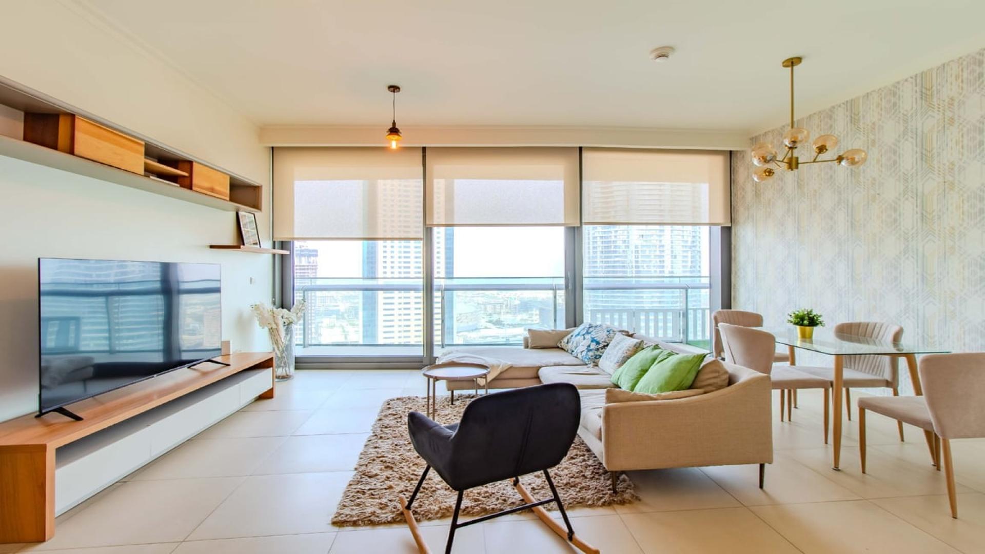 Luxurious living room in fully furnished Burj Vista apartment, Downtown Dubai, with city views