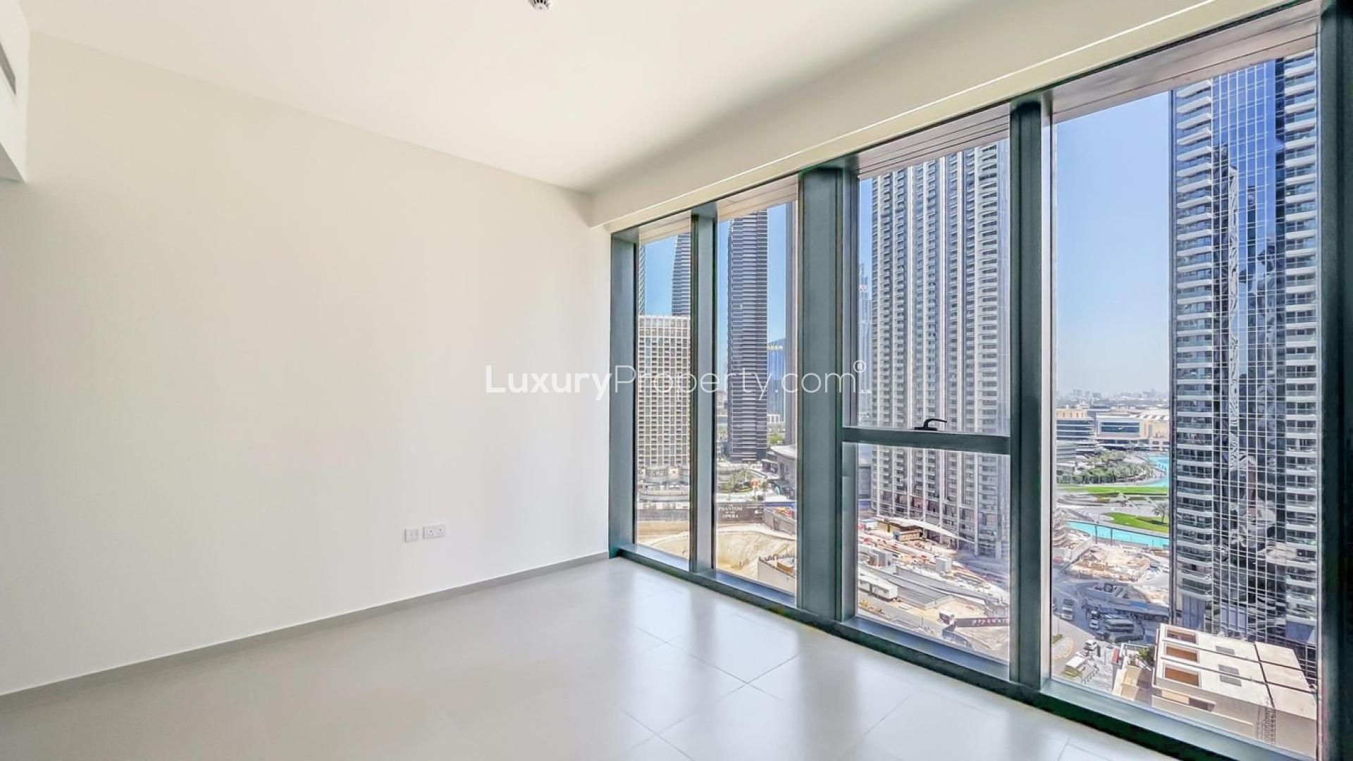 High-floor apartment interior with large windows in BLVD Heights, Downtown Dubai