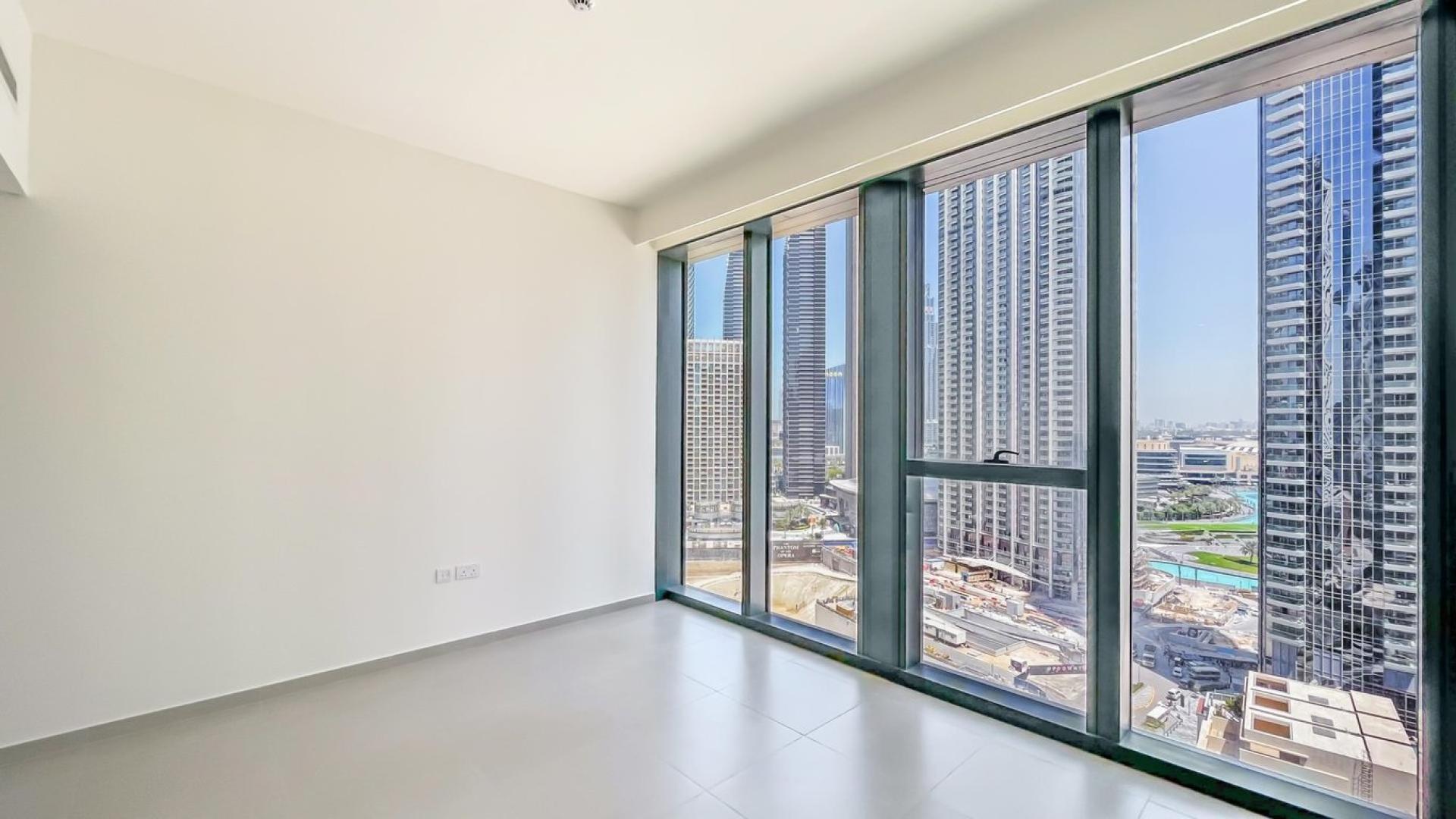 High-floor apartment interior with large windows in BLVD Heights, Downtown Dubai