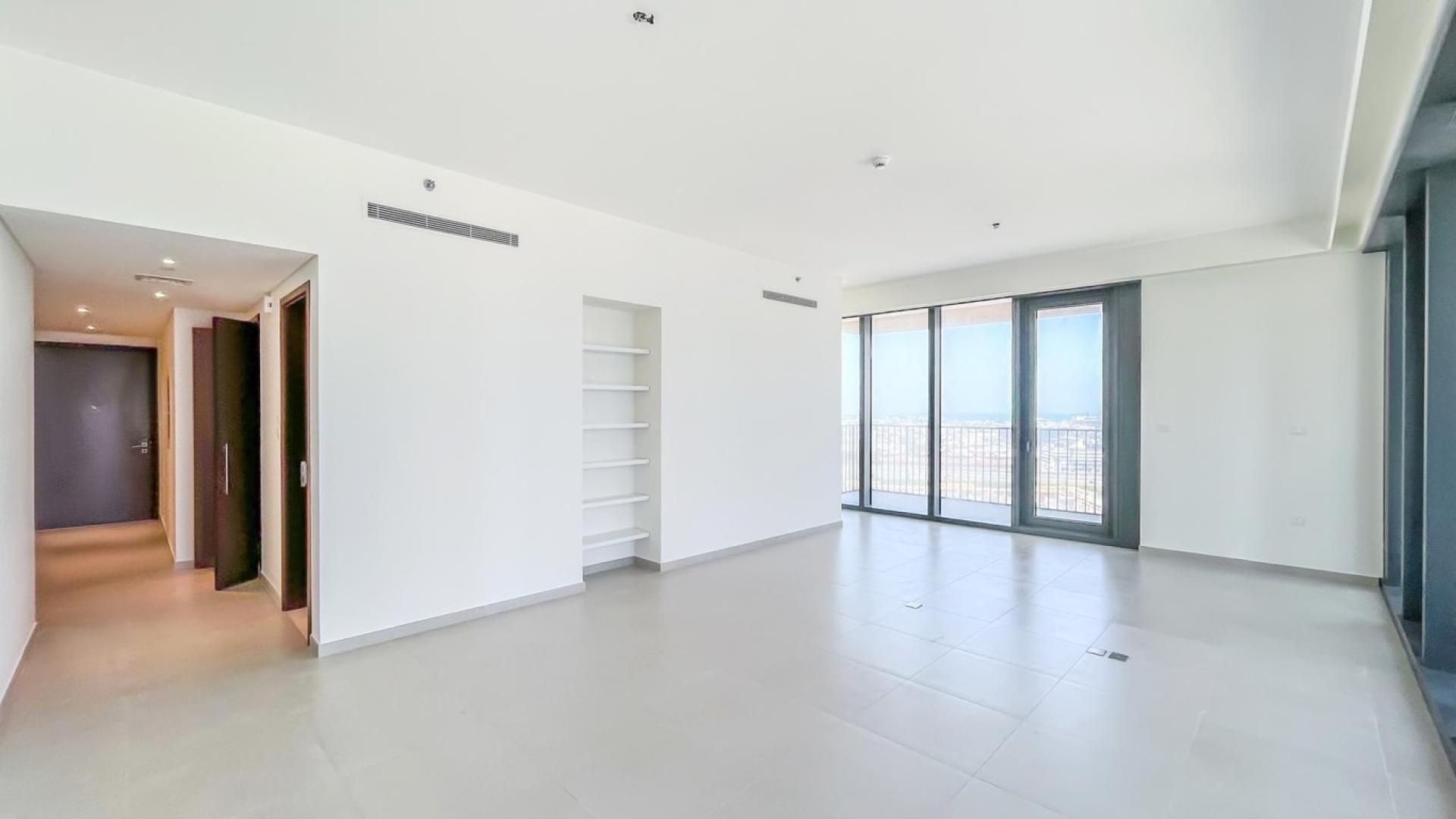 Empty living area in high-floor apartment, BLVD Heights, Downtown Dubai, with modern finishes