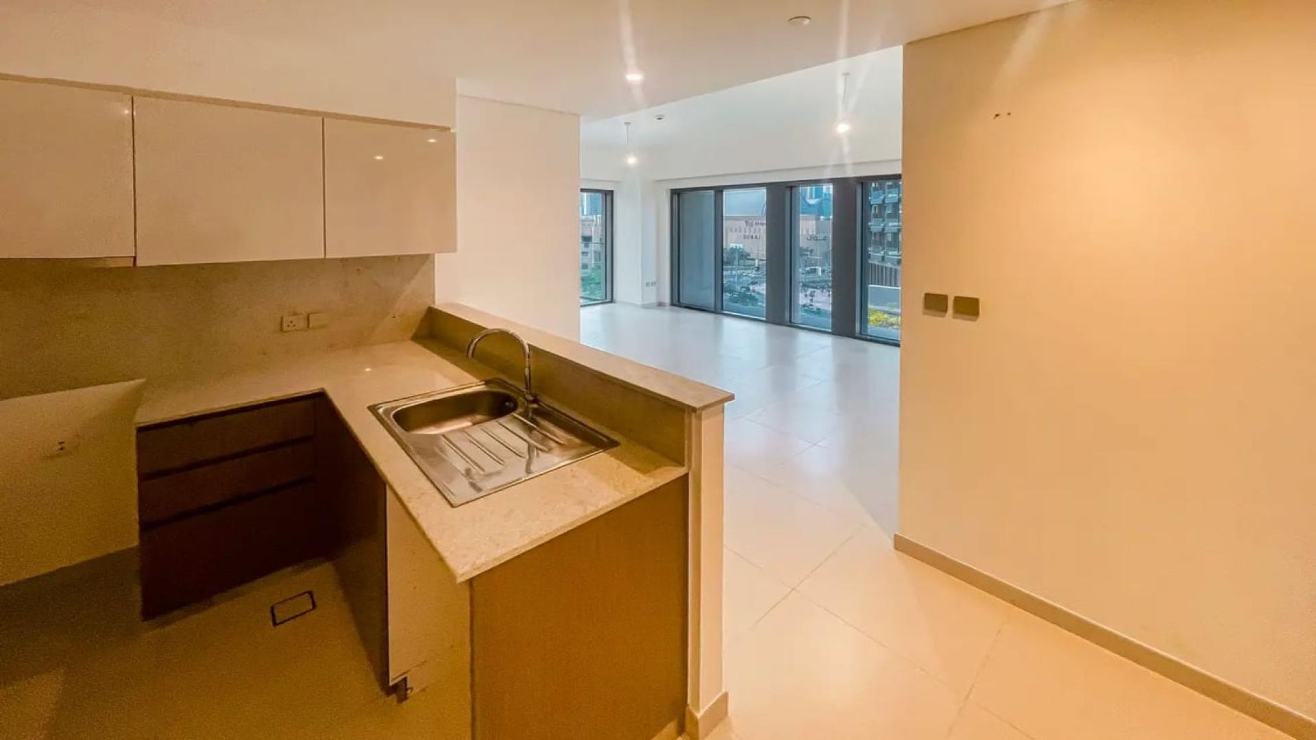 Modern kitchen in well-maintained apartment, Burj Royale, Downtown Dubai, available for rent