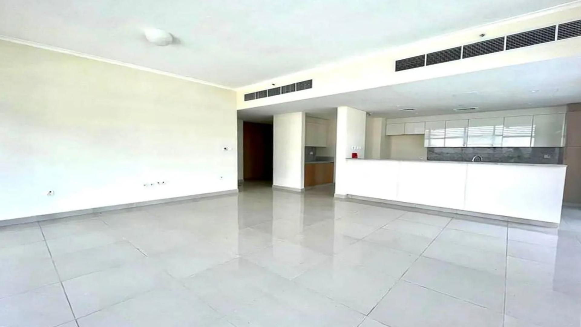 Unfurnished apartment living area with large windows in Dubai Hills Estate, Park Heights