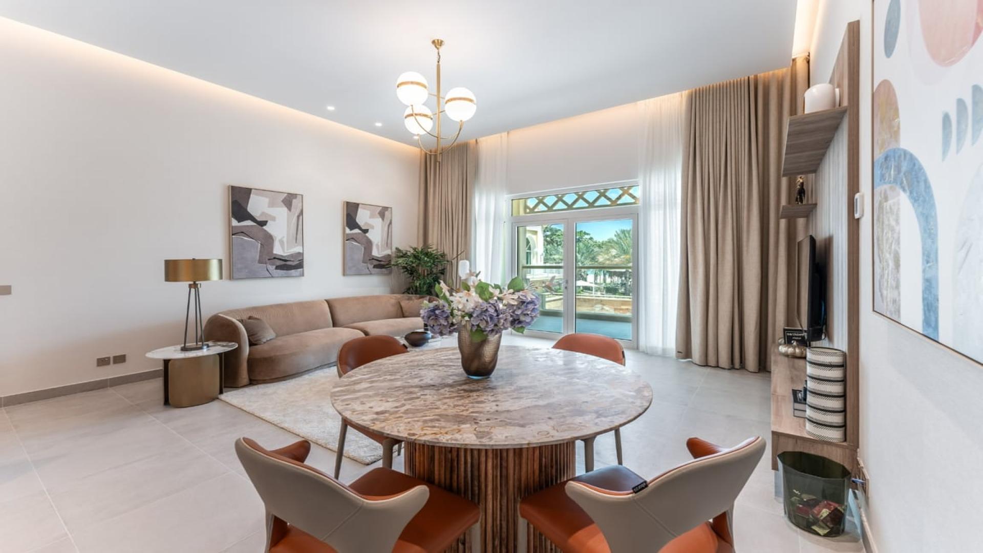 Fully upgraded Shoreline Apartments living room with elegant decor and beach view, Palm Jumeirah