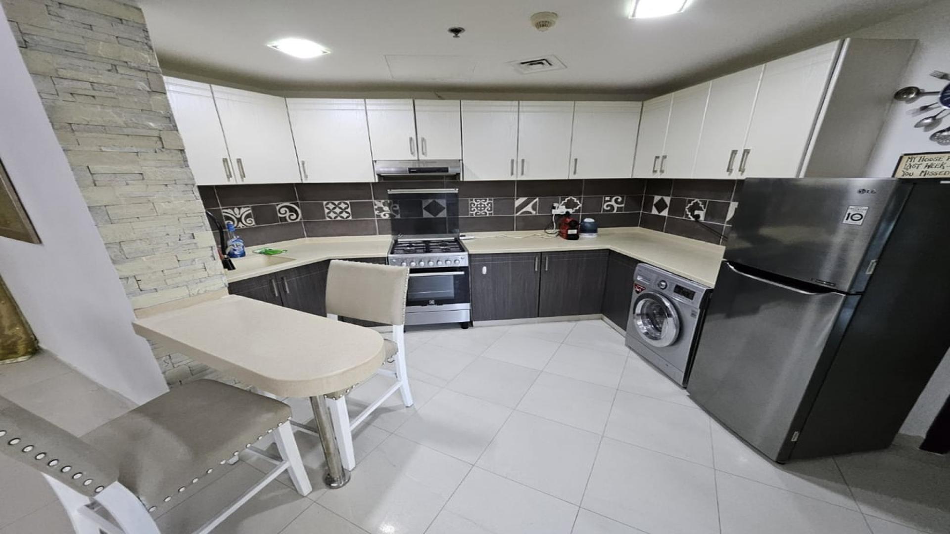 Modern furnished living room in Silicon Heights apartment, Dubai Silicon Oasis, for rent