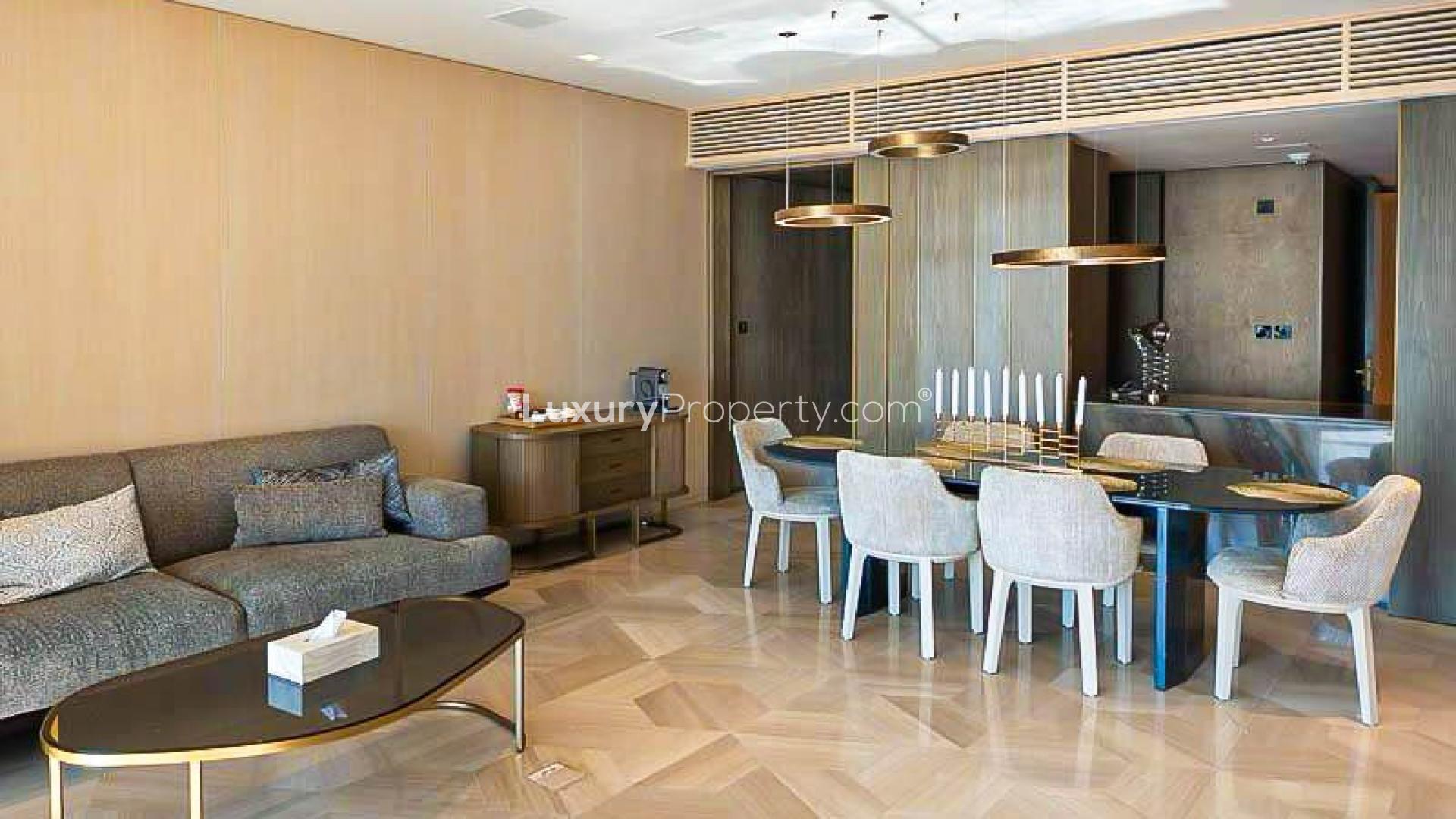 Furnished dining area in luxury Palm Jumeirah apartment with elegant decor and modern lighting