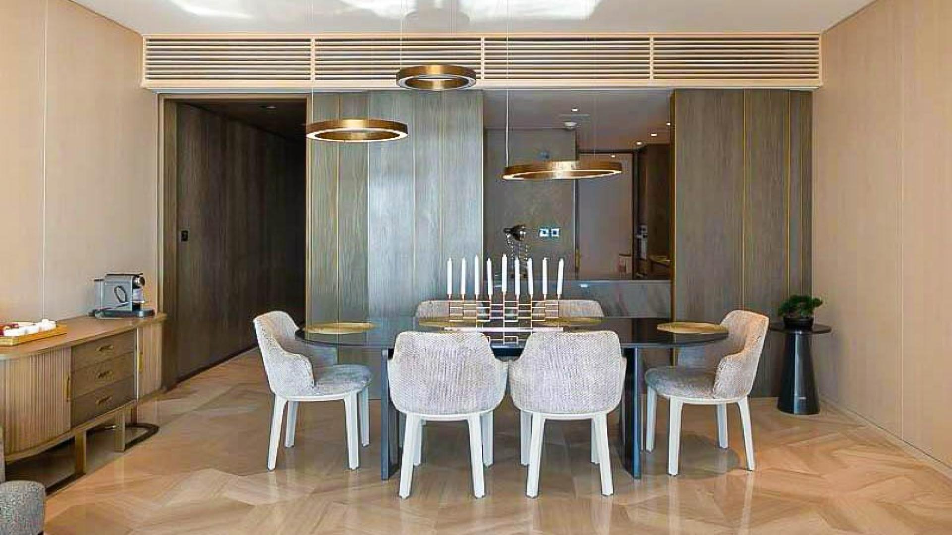 Furnished Palm Jumeirah apartment balcony with sea view, luxury finishing, skyline in background