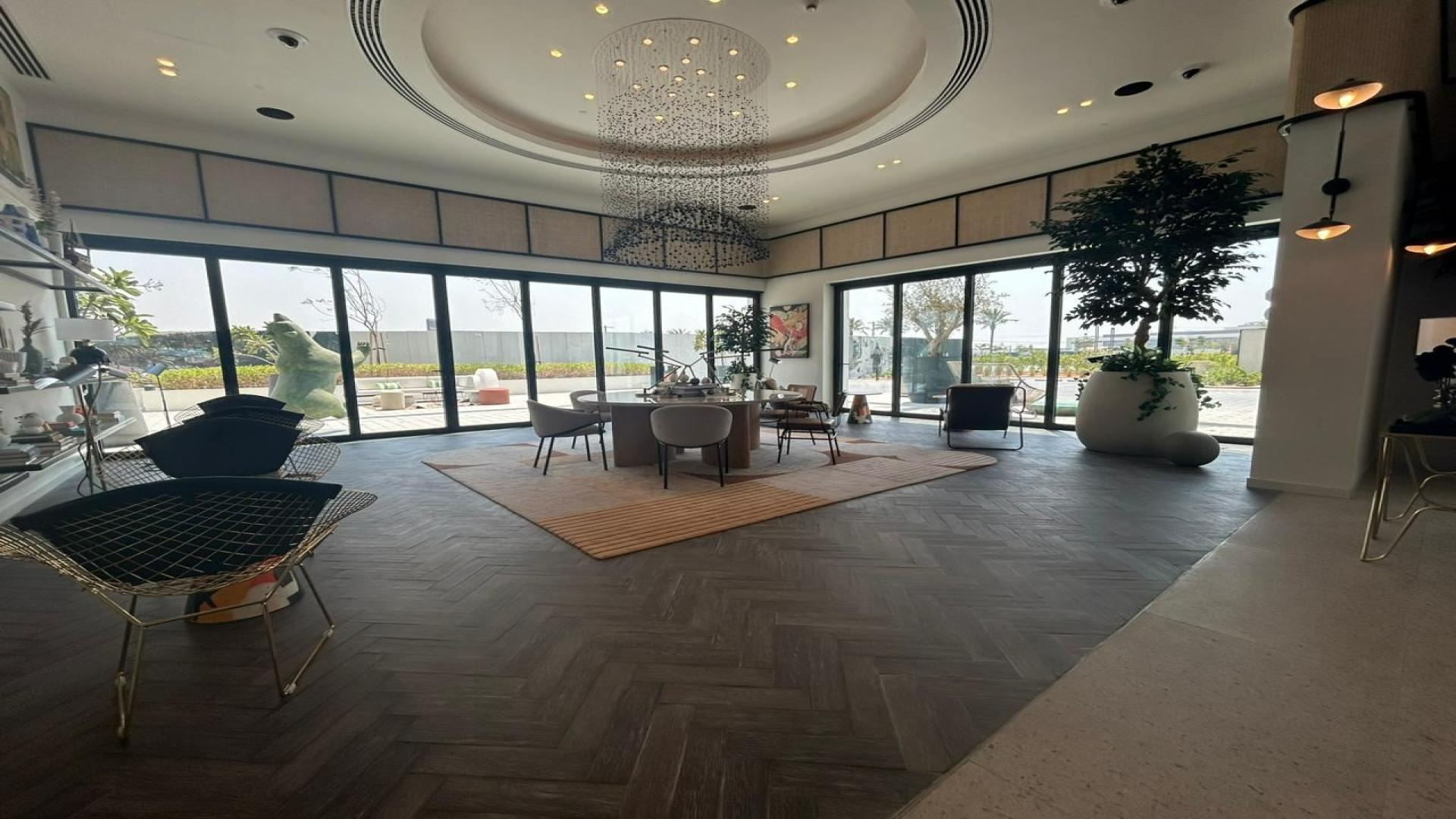 "Spacious modern lounge in Golfville apartment, Dubai Hills Estate with pool view and decor.","Spacious unfurnished apartment with pool view in Golfville, Dubai Hills Estate for rent.",Brand new unfurnished apartment with modern kitchen in Dubai Hills Estate, Golfville