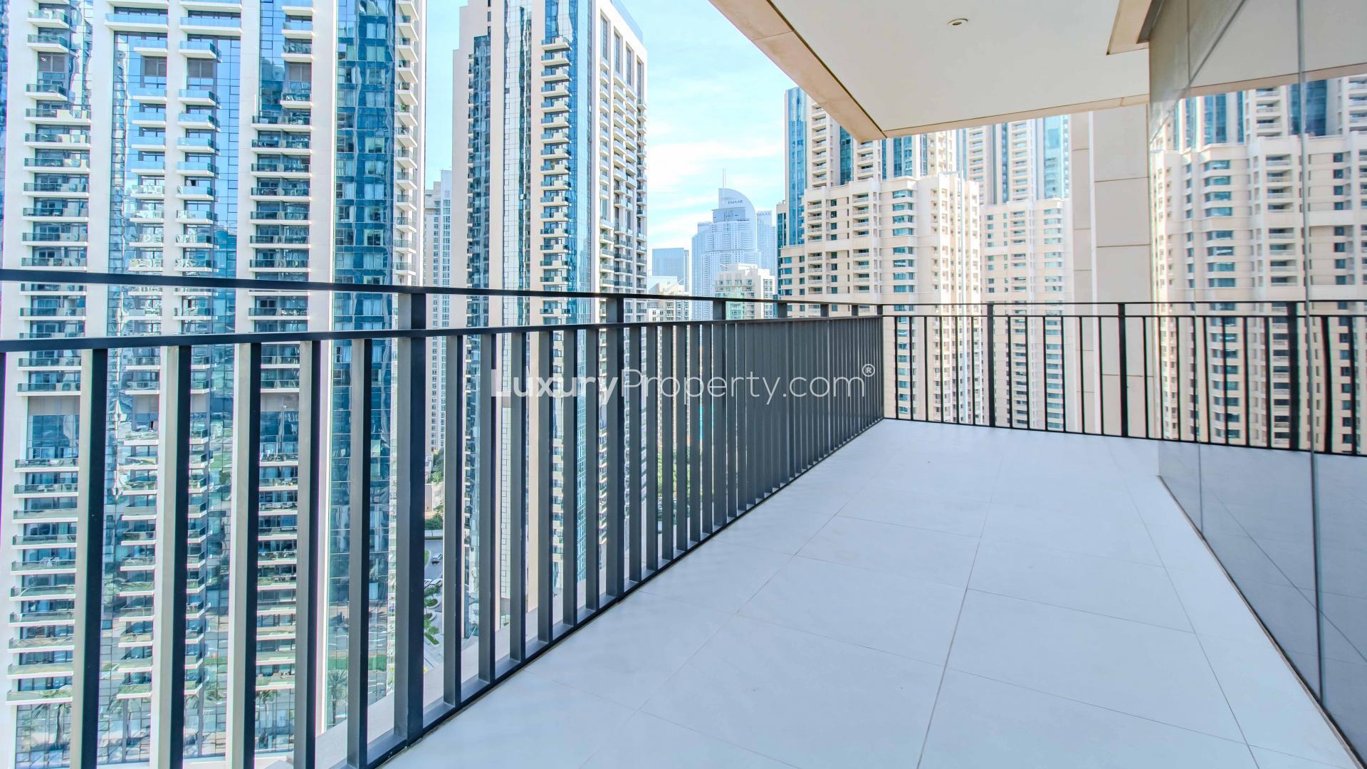 Spacious living room in luxury 2-bedroom apartment, BLVD Crescent, Downtown Dubai with city views