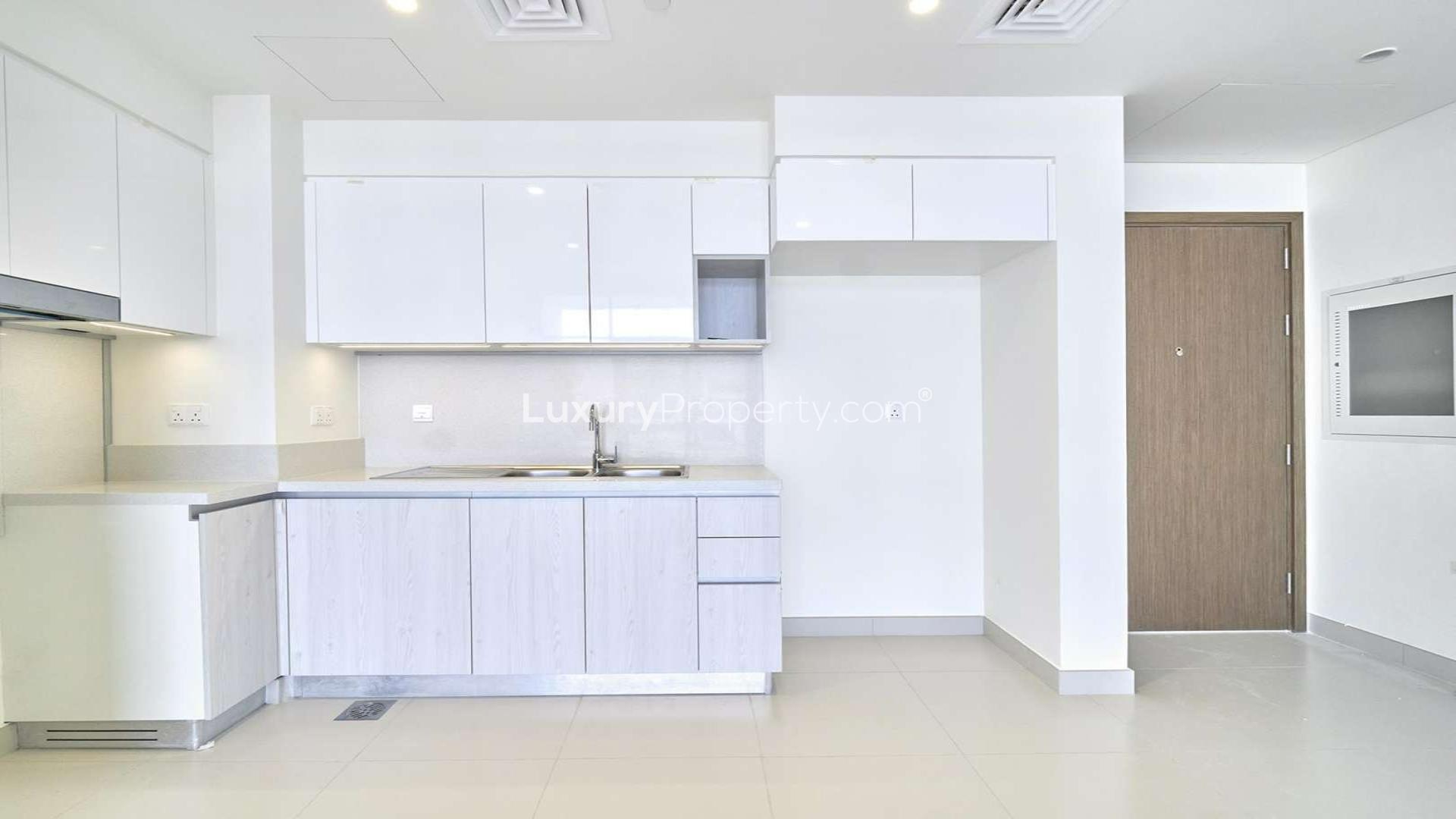 Modern kitchen in two-bedroom apartment, Dubai Hills Estate, Park Point, available for rent August