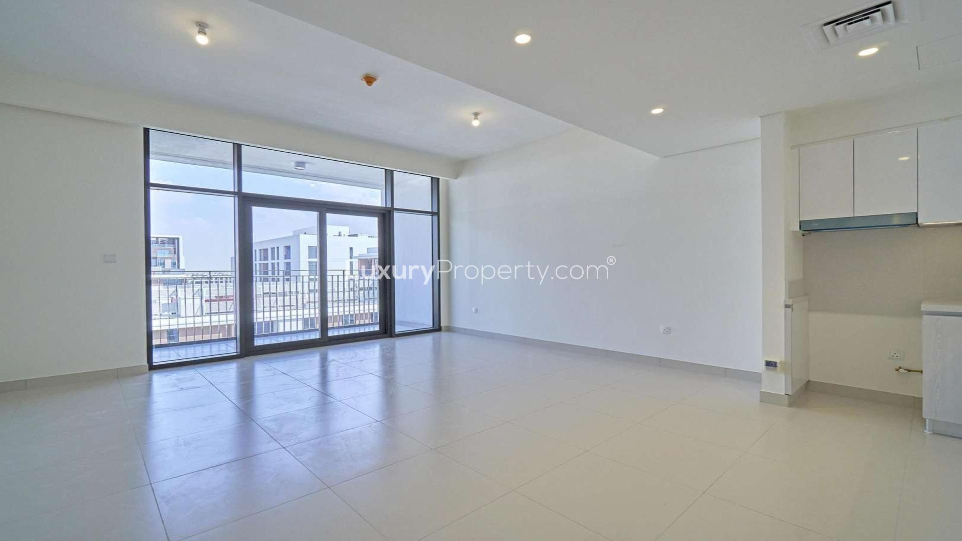 Aerial view of Park Point apartment complex in Dubai Hills Estate with courtyard and pool